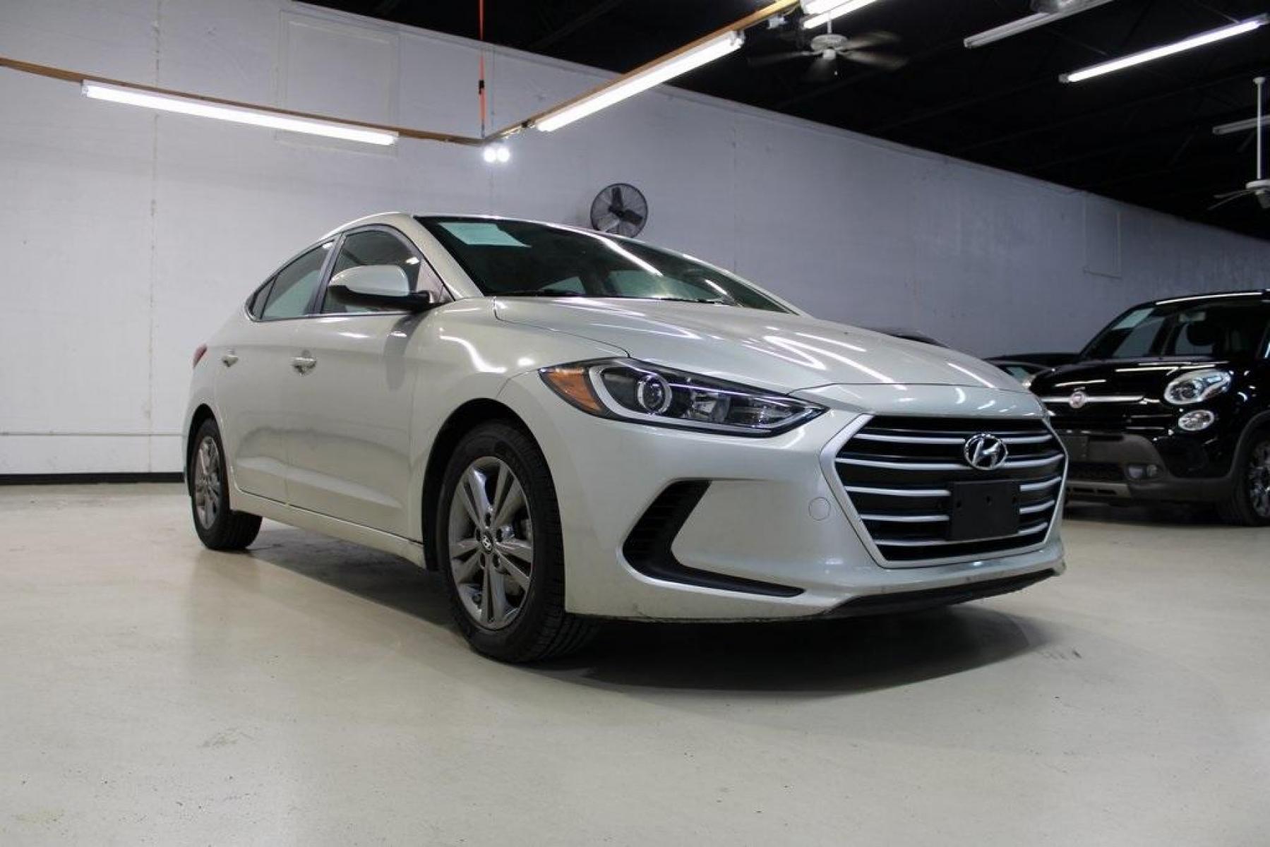 2017 Mineral Beige Pearl /Beige Hyundai Elantra SE (KMHD84LF6HU) with an 2.0L 4-Cylinder DOHC 16V engine, Automatic transmission, located at 15300 Midway Rd., Addison, TX, 75001, (972) 702-0011, 32.958321, -96.838074 - Photo #1