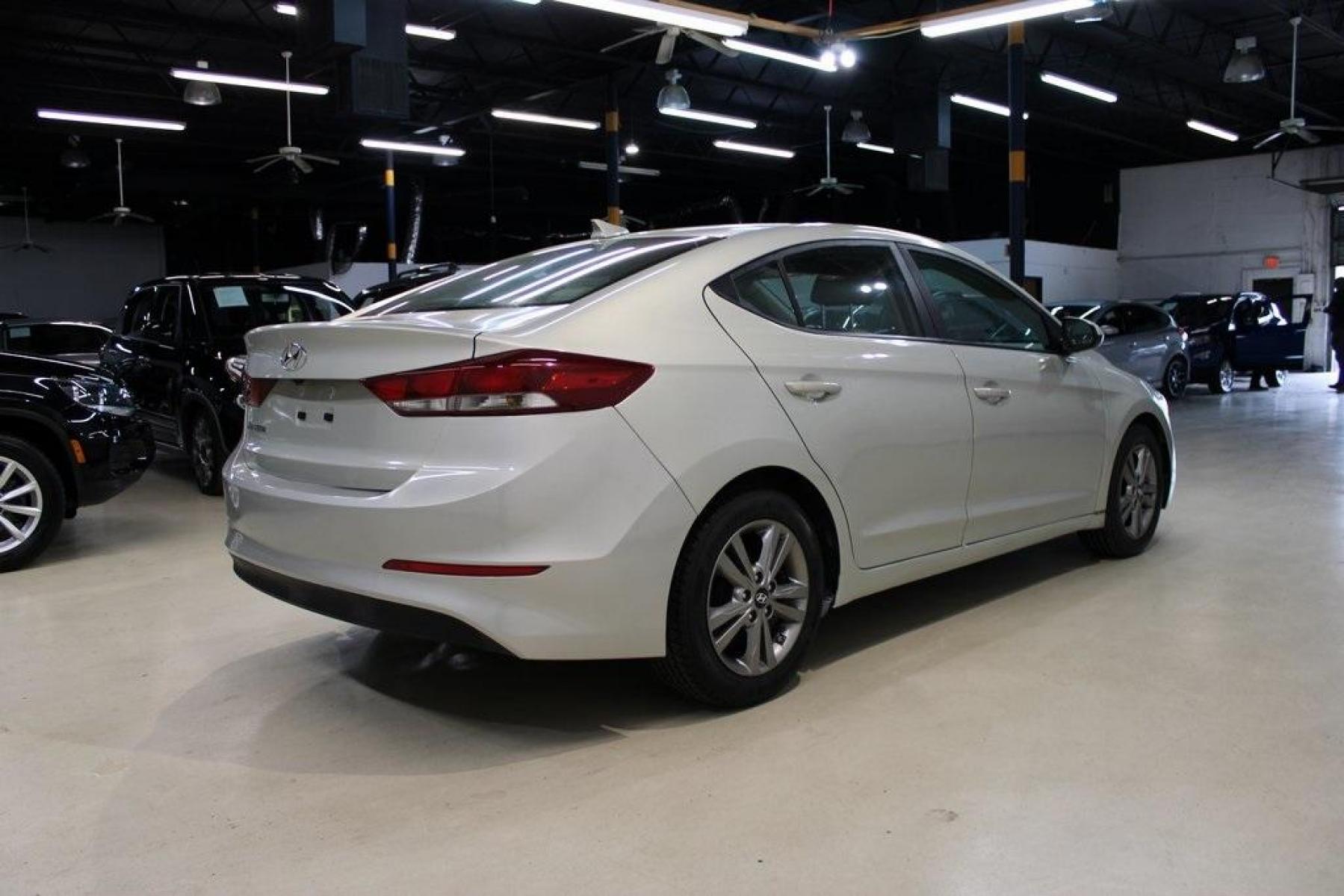2017 Mineral Beige Pearl /Beige Hyundai Elantra SE (KMHD84LF6HU) with an 2.0L 4-Cylinder DOHC 16V engine, Automatic transmission, located at 15300 Midway Rd., Addison, TX, 75001, (972) 702-0011, 32.958321, -96.838074 - Photo #2