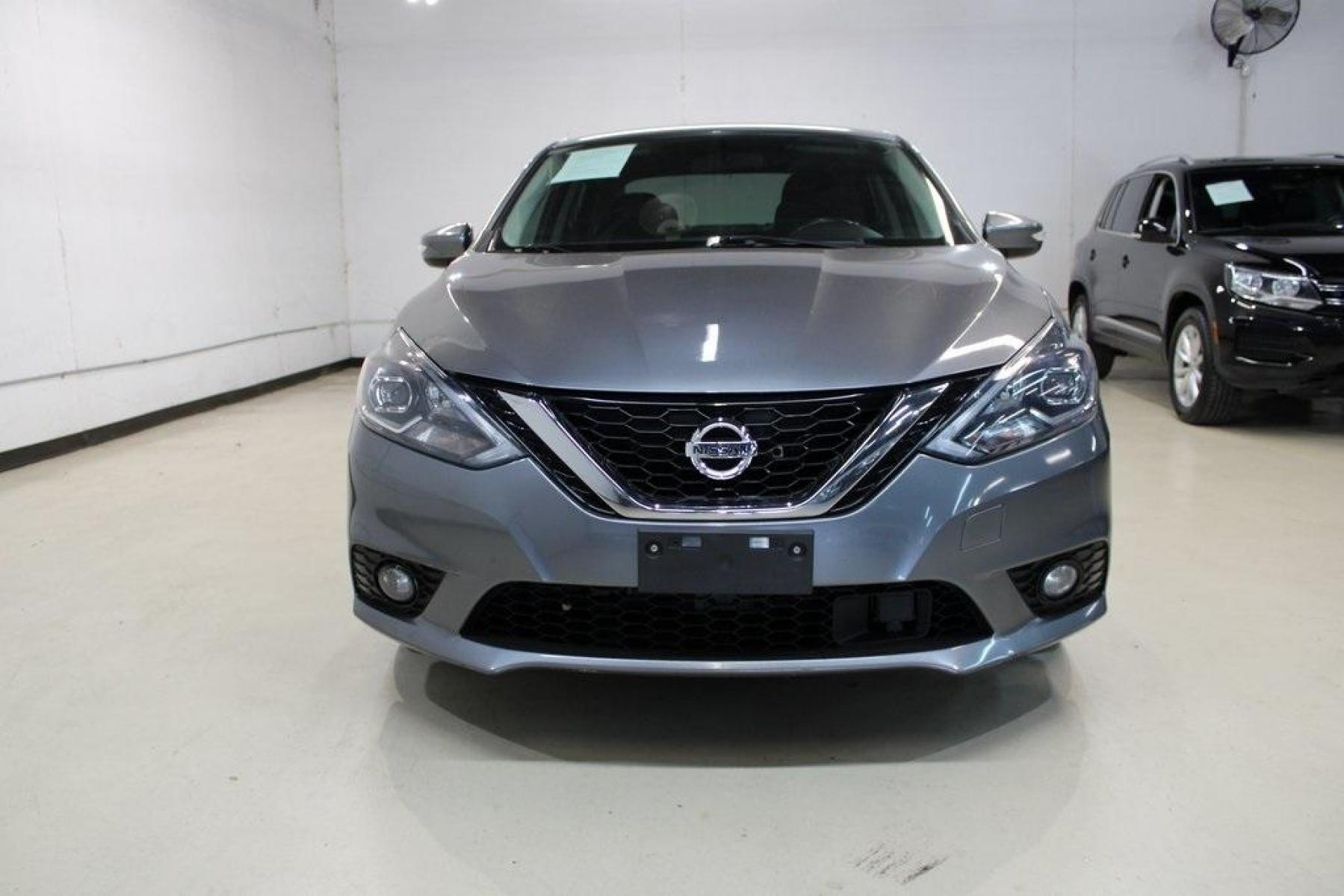 2019 Gun Metallic /Charcoal Nissan Sentra SR (3N1AB7AP0KY) with an 1.8L 4-Cylinder DOHC 16V engine, CVT transmission, located at 15300 Midway Rd., Addison, TX, 75001, (972) 702-0011, 32.958321, -96.838074 - HOME OF THE NO HAGGLE PRICE - WHOLESALE PRICES TO THE PUBLIC!! Sentra SR, 4D Sedan, 1.8L 4-Cylinder DOHC 16V, CVT with Xtronic, FWD, Gun Metallic, Charcoal Cloth.<br><br>Gun Metallic 2019 Nissan Sentra SR<br><br>Recent Arrival! 29/37 City/Highway MPG<br><br><br>At Midway Auto Group, we strive to pro - Photo #5