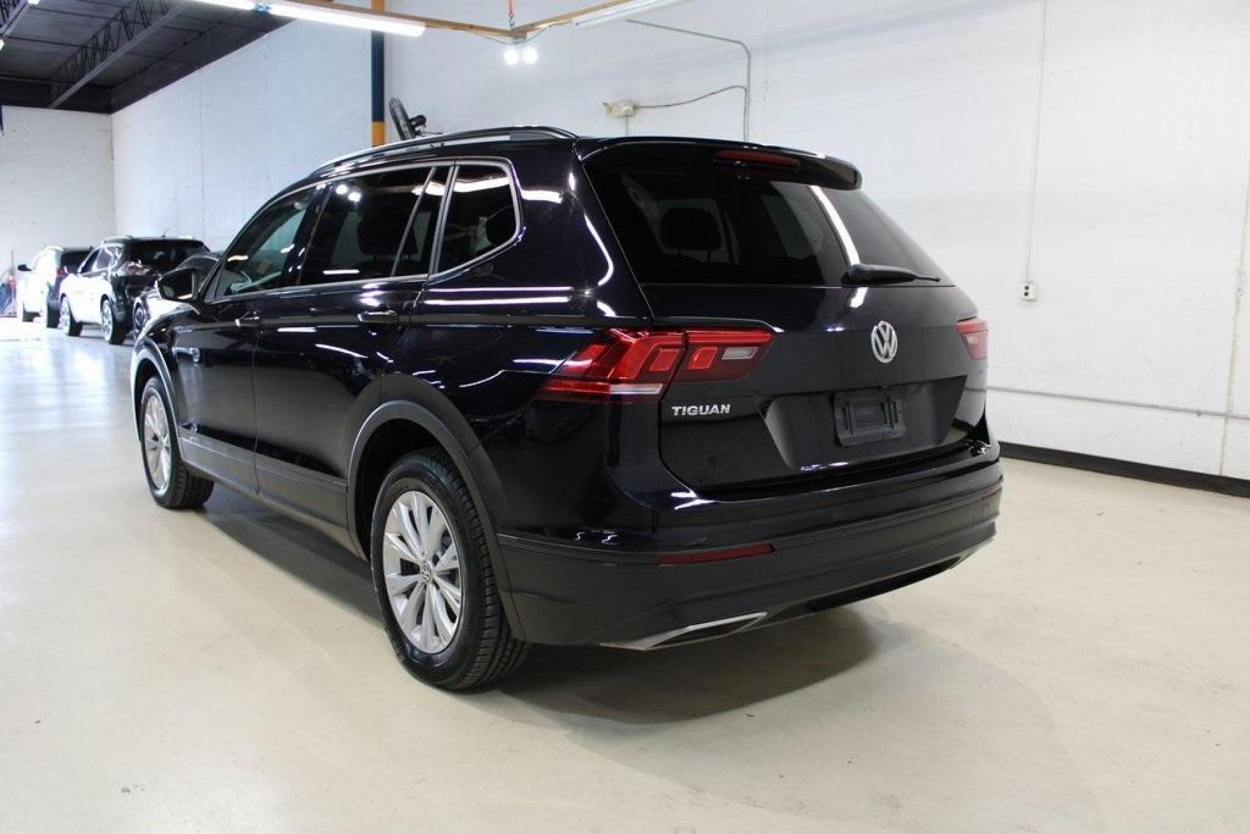 2019 Deep Black Pearl /Storm Gray Volkswagen Tiguan 2.0T S (3VV1B7AX6KM) with an 2.0L TSI DOHC engine, Automatic transmission, located at 15300 Midway Rd., Addison, TX, 75001, (972) 702-0011, 32.958321, -96.838074 - HOME OF THE NO HAGGLE PRICE - WHOLESALE PRICES TO THE PUBLIC!! Tiguan 2.0T S, 4D Sport Utility, 2.0L TSI DOHC, 8-Speed Automatic with Tiptronic, FWD, Black, Storm Gray Cloth.<br><br>Black 2019 Volkswagen Tiguan 2.0T S<br><br>22/29 City/Highway MPG<br><br><br>At Midway Auto Group, we strive to provid - Photo #3
