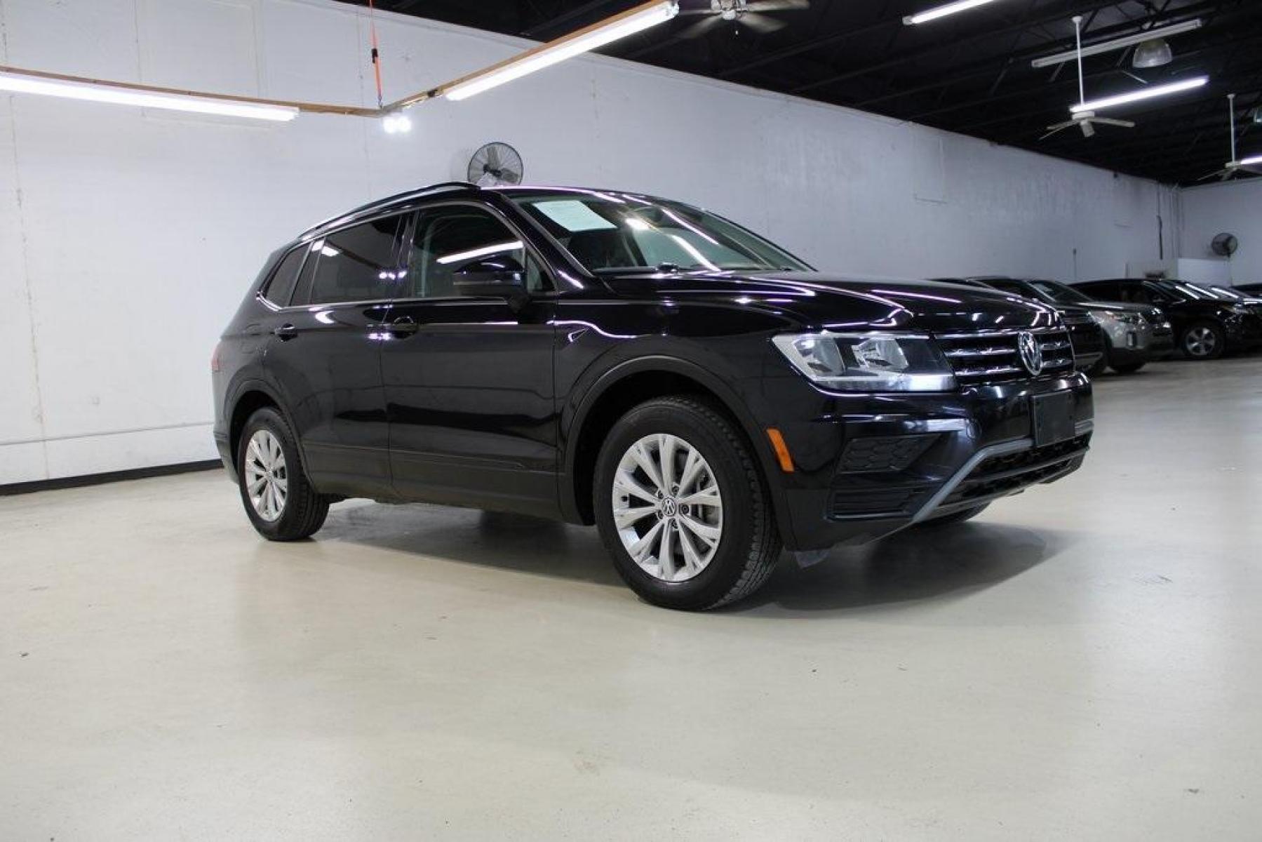 2019 Deep Black Pearl /Storm Gray Volkswagen Tiguan 2.0T S (3VV1B7AX6KM) with an 2.0L TSI DOHC engine, Automatic transmission, located at 15300 Midway Rd., Addison, TX, 75001, (972) 702-0011, 32.958321, -96.838074 - HOME OF THE NO HAGGLE PRICE - WHOLESALE PRICES TO THE PUBLIC!! Tiguan 2.0T S, 4D Sport Utility, 2.0L TSI DOHC, 8-Speed Automatic with Tiptronic, FWD, Black, Storm Gray Cloth.<br><br>Black 2019 Volkswagen Tiguan 2.0T S<br><br>22/29 City/Highway MPG<br><br><br>At Midway Auto Group, we strive to provid - Photo #6