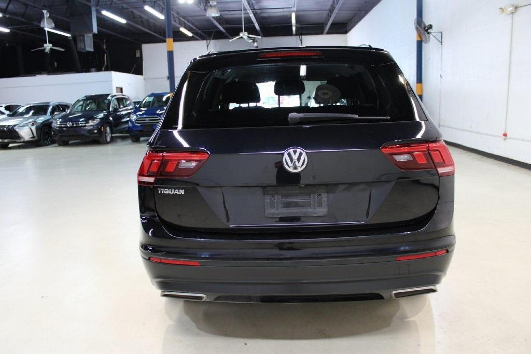 2019 Deep Black Pearl /Storm Gray Volkswagen Tiguan 2.0T S (3VV1B7AX6KM) with an 2.0L TSI DOHC engine, Automatic transmission, located at 15300 Midway Rd., Addison, TX, 75001, (972) 702-0011, 32.958321, -96.838074 - HOME OF THE NO HAGGLE PRICE - WHOLESALE PRICES TO THE PUBLIC!! Tiguan 2.0T S, 4D Sport Utility, 2.0L TSI DOHC, 8-Speed Automatic with Tiptronic, FWD, Black, Storm Gray Cloth.<br><br>Black 2019 Volkswagen Tiguan 2.0T S<br><br>22/29 City/Highway MPG<br><br><br>At Midway Auto Group, we strive to provid - Photo #7