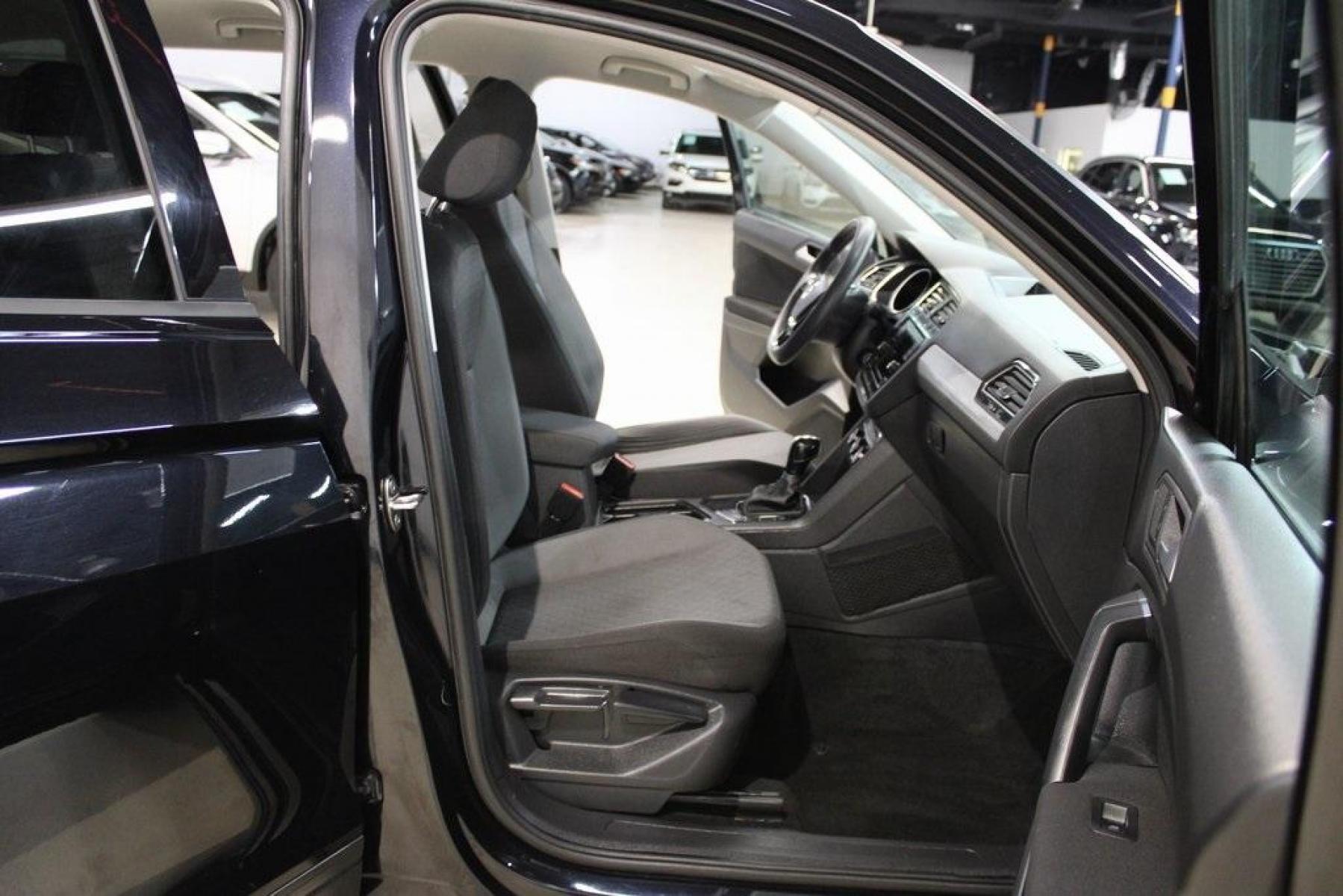 2019 Deep Black Pearl /Storm Gray Volkswagen Tiguan 2.0T S (3VV1B7AX6KM) with an 2.0L TSI DOHC engine, Automatic transmission, located at 15300 Midway Rd., Addison, TX, 75001, (972) 702-0011, 32.958321, -96.838074 - HOME OF THE NO HAGGLE PRICE - WHOLESALE PRICES TO THE PUBLIC!! Tiguan 2.0T S, 4D Sport Utility, 2.0L TSI DOHC, 8-Speed Automatic with Tiptronic, FWD, Black, Storm Gray Cloth.<br><br>Black 2019 Volkswagen Tiguan 2.0T S<br><br>22/29 City/Highway MPG<br><br><br>At Midway Auto Group, we strive to provid - Photo #15