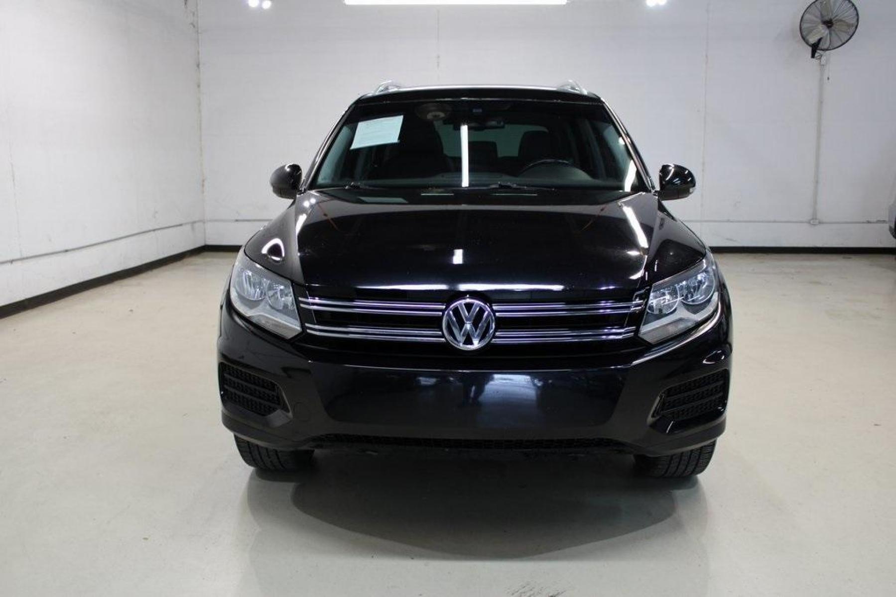 2017 Deep Black Pearl /Charcoal Black, Leat Volkswagen Tiguan Wolfsburg (WVGRV7AX4HW) with an 2.0L TSI DOHC engine, Automatic transmission, located at 15300 Midway Rd., Addison, TX, 75001, (972) 702-0011, 32.958321, -96.838074 - Photo #5