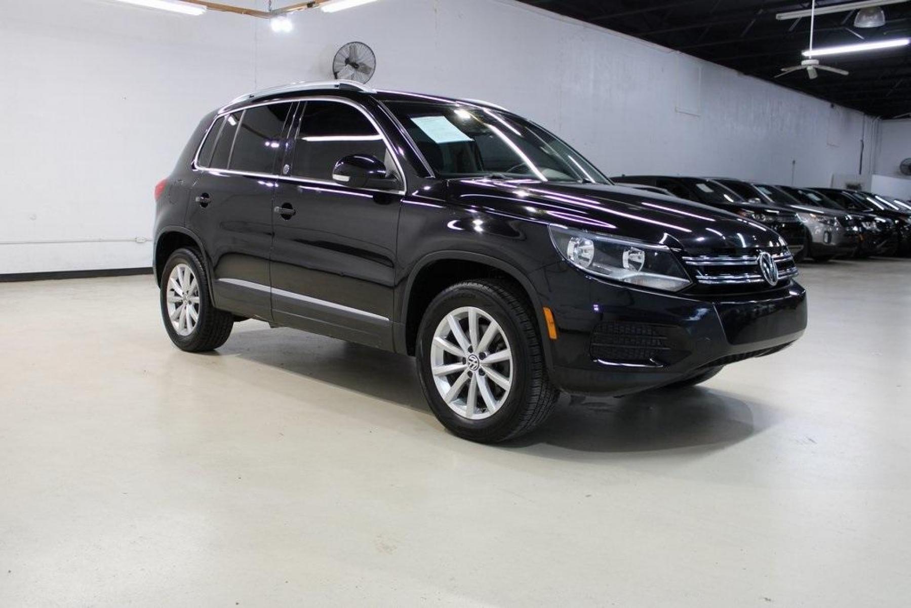 2017 Deep Black Pearl /Charcoal Black, Leat Volkswagen Tiguan Wolfsburg (WVGRV7AX4HW) with an 2.0L TSI DOHC engine, Automatic transmission, located at 15300 Midway Rd., Addison, TX, 75001, (972) 702-0011, 32.958321, -96.838074 - Photo #6