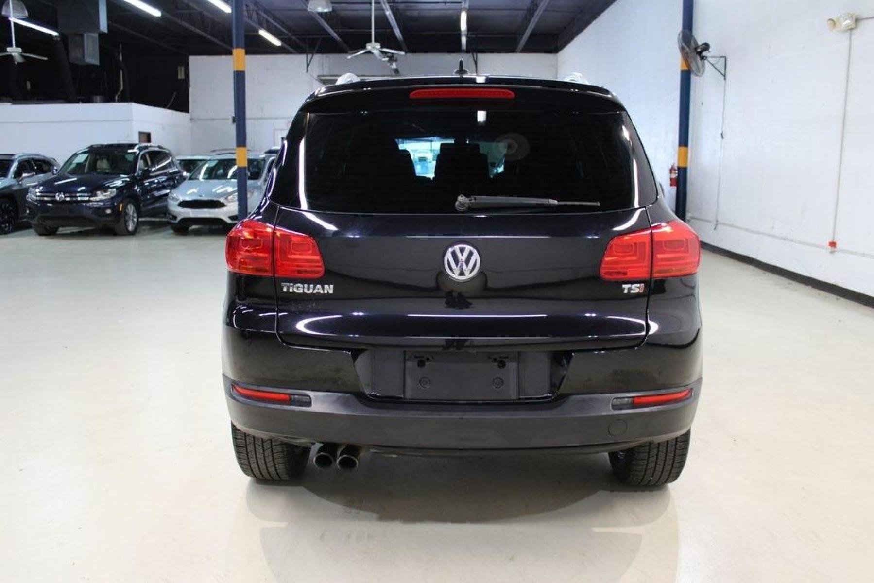 2017 Deep Black Pearl /Charcoal Black, Leat Volkswagen Tiguan Wolfsburg (WVGRV7AX4HW) with an 2.0L TSI DOHC engine, Automatic transmission, located at 15300 Midway Rd., Addison, TX, 75001, (972) 702-0011, 32.958321, -96.838074 - Photo #7