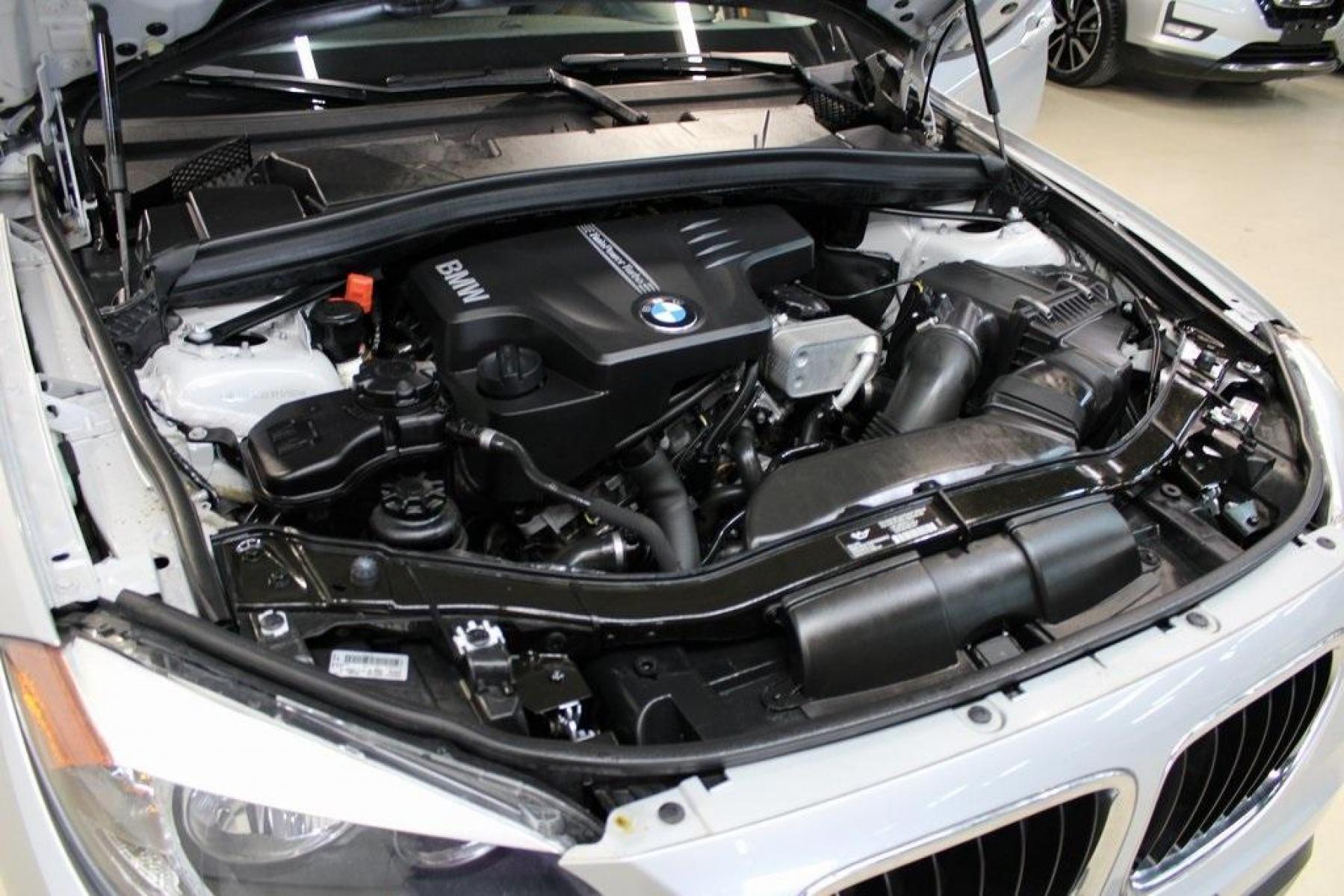 2014 Glacier Silver Metallic /Black BMW X1 xDrive28i (WBAVL1C58EV) with an 2.0L 4-Cylinder DOHC 16V TwinPower Turbo engine, Automatic transmission, located at 15300 Midway Rd., Addison, TX, 75001, (972) 702-0011, 32.958321, -96.838074 - Photo #28