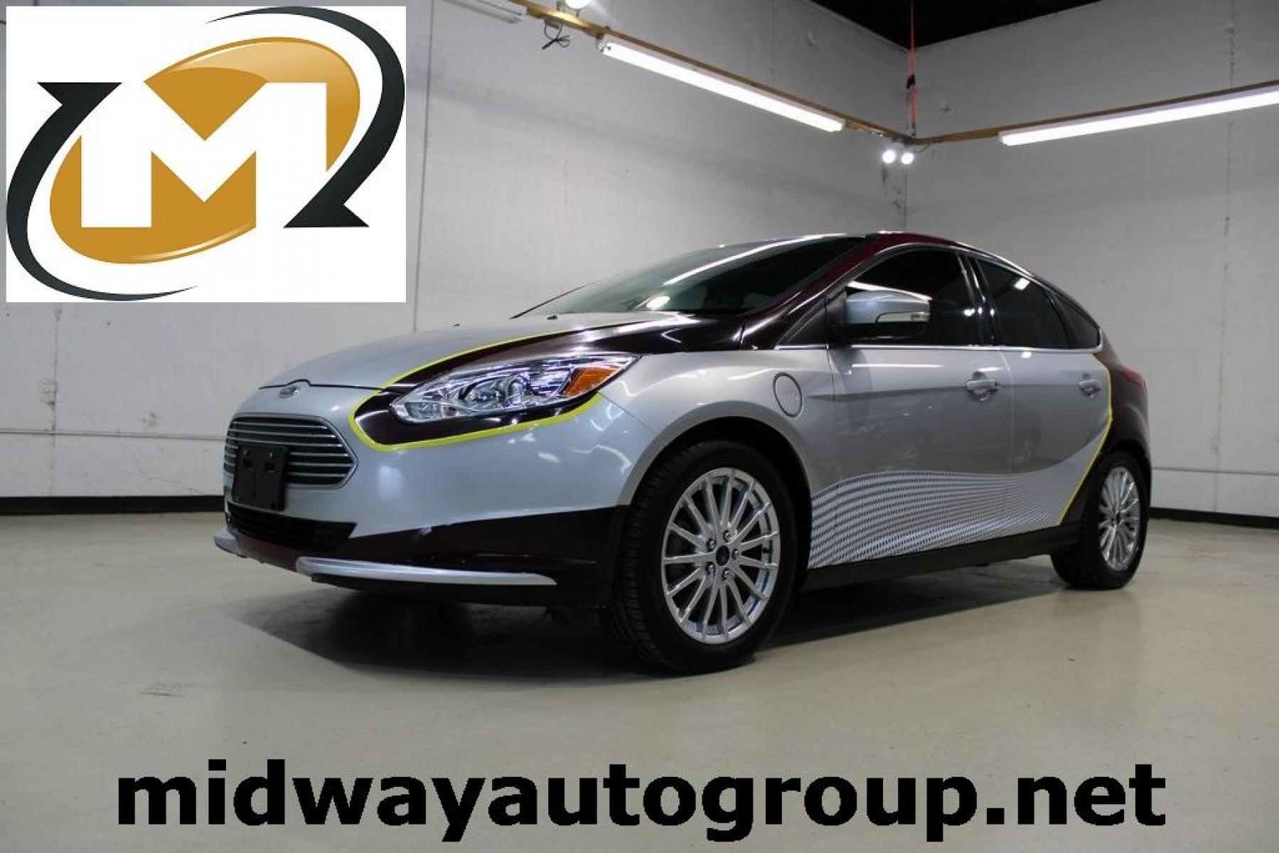 2014 Ingot Silver Metallic /Medium Light Stone Ford Focus Electric Base (1FADP3R42EL) with an 107kW Electric Motor engine, Automatic transmission, located at 15300 Midway Rd., Addison, TX, 75001, (972) 702-0011, 32.958321, -96.838074 - Photo #0