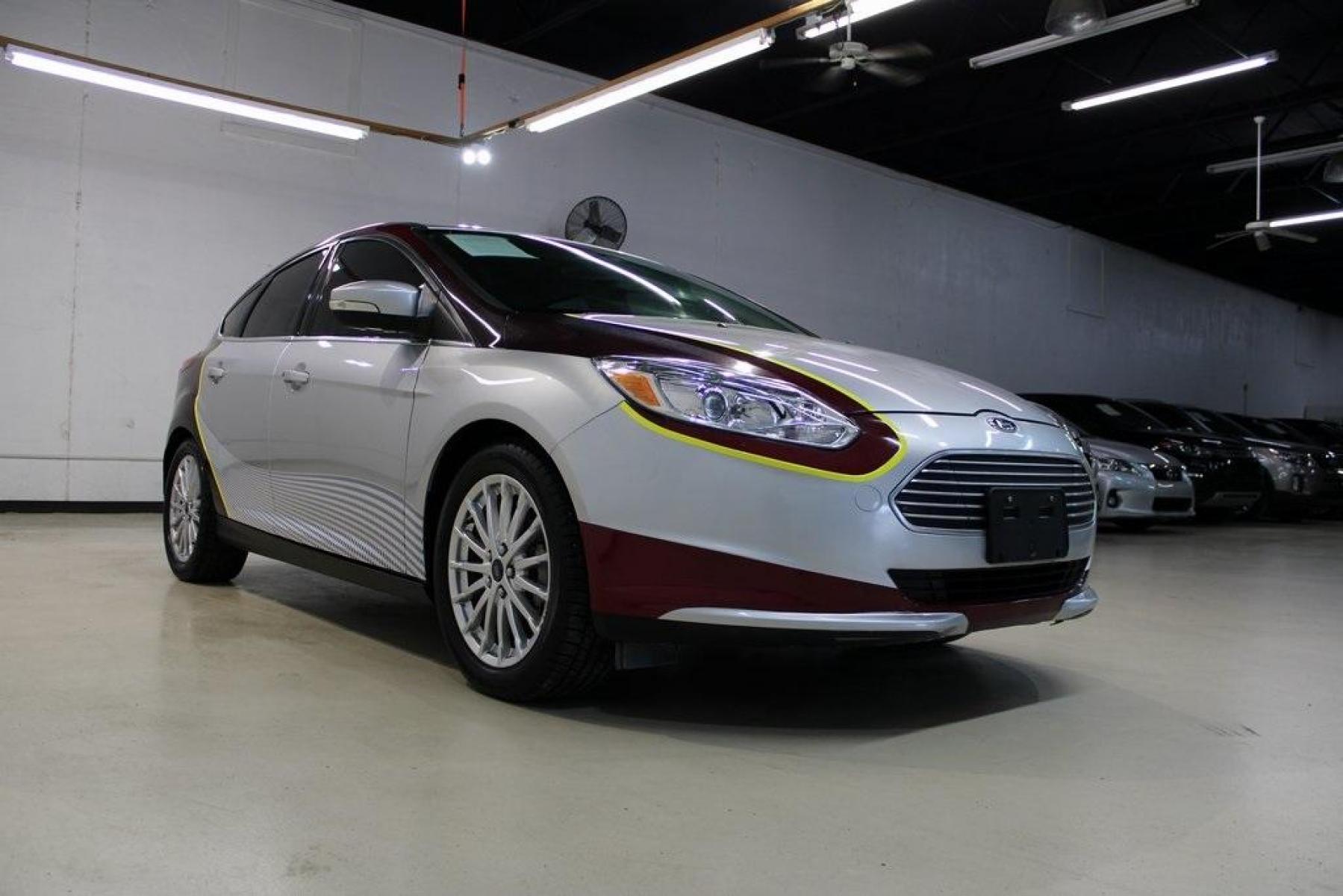 2014 Ingot Silver Metallic /Medium Light Stone Ford Focus Electric Base (1FADP3R42EL) with an 107kW Electric Motor engine, Automatic transmission, located at 15300 Midway Rd., Addison, TX, 75001, (972) 702-0011, 32.958321, -96.838074 - Photo #1