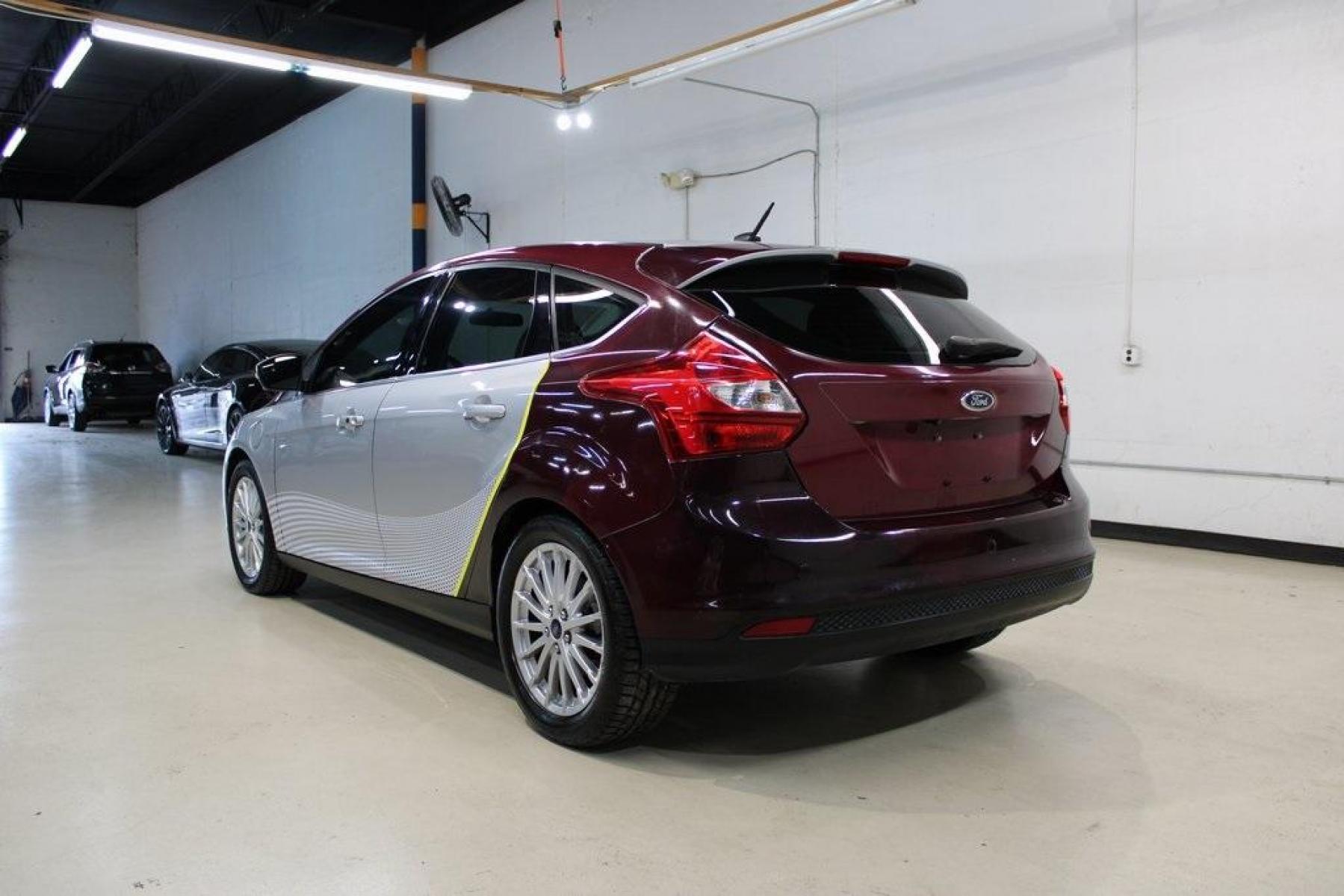 2014 Ingot Silver Metallic /Medium Light Stone Ford Focus Electric Base (1FADP3R42EL) with an 107kW Electric Motor engine, Automatic transmission, located at 15300 Midway Rd., Addison, TX, 75001, (972) 702-0011, 32.958321, -96.838074 - Photo #3