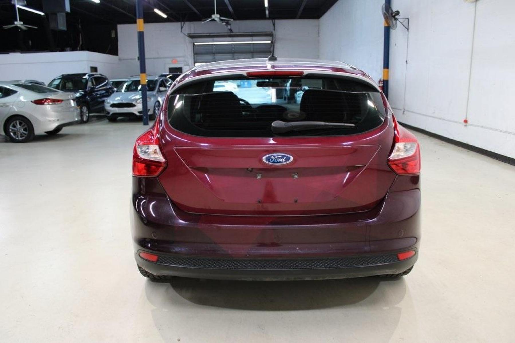 2014 Ingot Silver Metallic /Medium Light Stone Ford Focus Electric Base (1FADP3R42EL) with an 107kW Electric Motor engine, Automatic transmission, located at 15300 Midway Rd., Addison, TX, 75001, (972) 702-0011, 32.958321, -96.838074 - Photo #7
