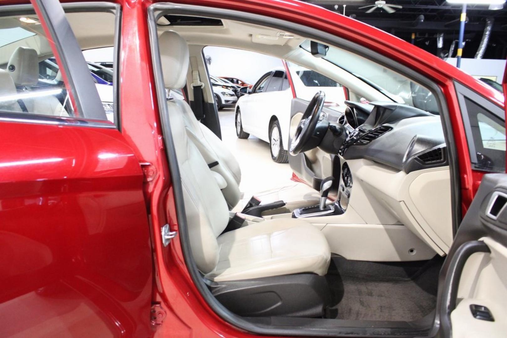 2017 Ruby Red Metallic Tinted Clearcoat Ford Fiesta Titanium (3FADP4CJ8HM) with an 1.6L I4 Ti-VCT engine, Automatic transmission, located at 15300 Midway Rd., Addison, TX, 75001, (972) 702-0011, 32.958321, -96.838074 - Photo#14