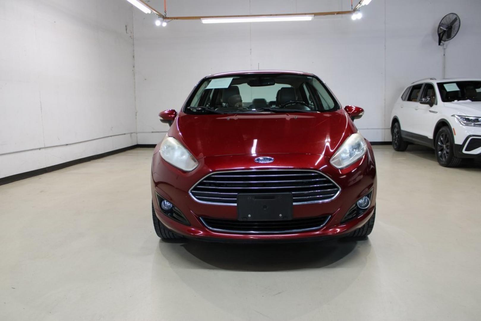 2017 Ruby Red Metallic Tinted Clearcoat Ford Fiesta Titanium (3FADP4CJ8HM) with an 1.6L I4 Ti-VCT engine, Automatic transmission, located at 15300 Midway Rd., Addison, TX, 75001, (972) 702-0011, 32.958321, -96.838074 - Photo#5