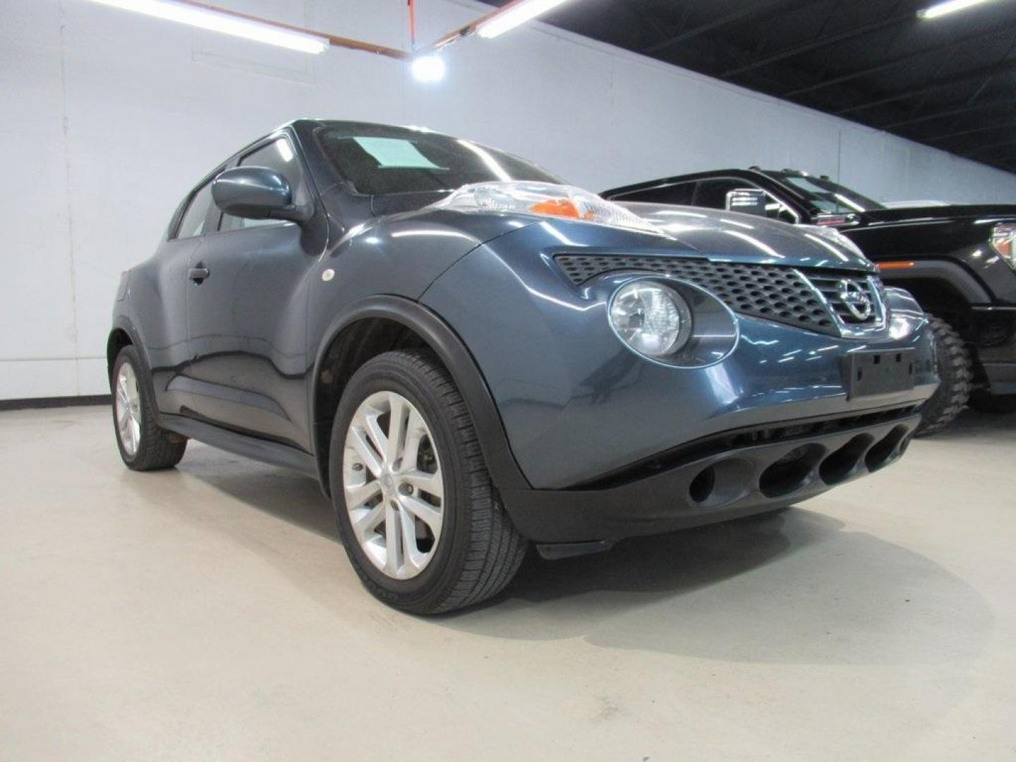 2013 Graphite Blue /Black Nissan Juke S (JN8AF5MV7DT) with an 1.6L I4 DOHC 16V engine, CVT transmission, located at 15300 Midway Rd., Addison, TX, 75001, (972) 702-0011, 32.958321, -96.838074 - Photo#1