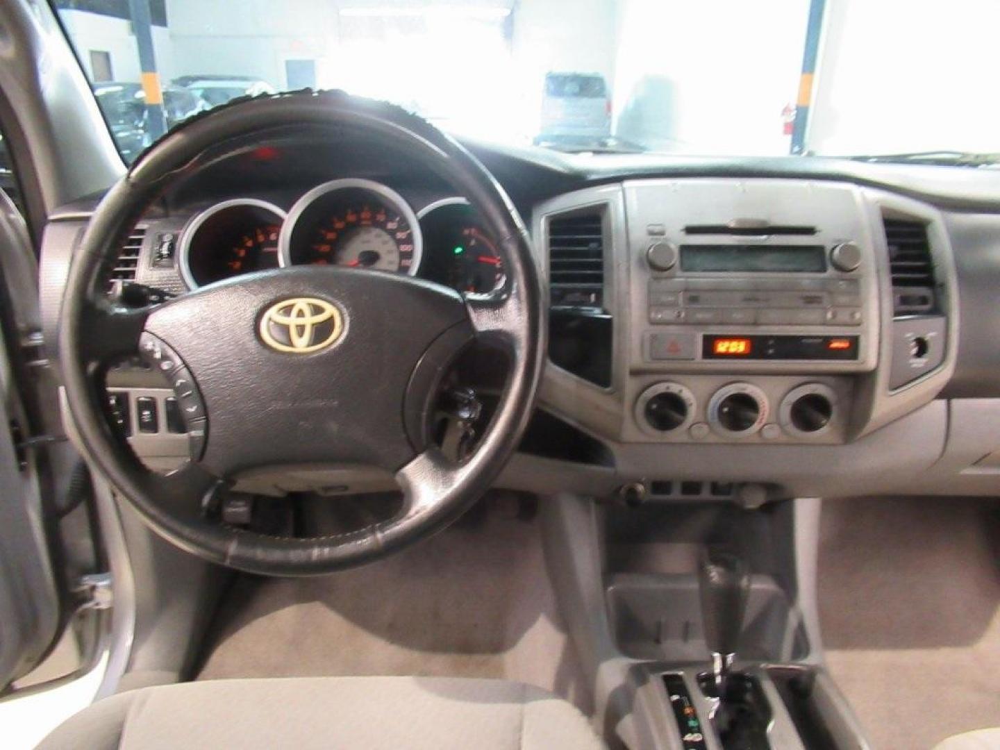 2010 Silver /Graphite Toyota Tacoma PreRunner (5TETU4GN6AZ) with an 4.0L V6 SMPI DOHC engine, Automatic transmission, located at 15300 Midway Rd., Addison, TX, 75001, (972) 702-0011, 32.958321, -96.838074 - HOME OF THE NO HAGGLE PRICE - WHOLESALE PRICES TO THE PUBLIC!! Tacoma PreRunner V6, 4D Access Cab, 4.0L V6 SMPI DOHC, 5-Speed Automatic with Overdrive, RWD, Silver, Graphite Cloth.<br><br>Silver 2010 Toyota Tacoma PreRunner<br><br><br>Awards:<br> * 2010 KBB.com Best Resale Value Awards<br><br>At Mi - Photo#19