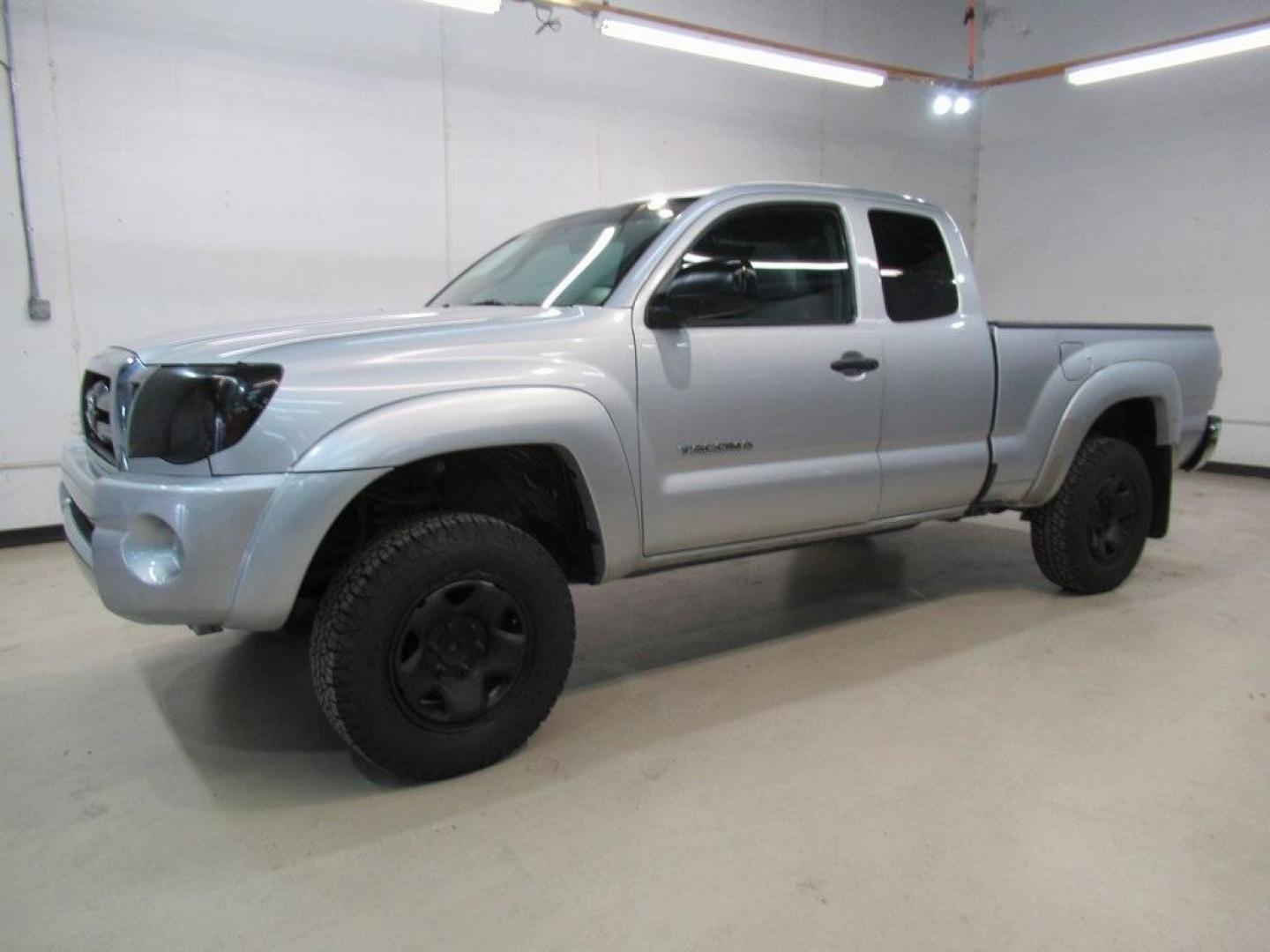 2010 Silver /Graphite Toyota Tacoma PreRunner (5TETU4GN6AZ) with an 4.0L V6 SMPI DOHC engine, Automatic transmission, located at 15300 Midway Rd., Addison, TX, 75001, (972) 702-0011, 32.958321, -96.838074 - HOME OF THE NO HAGGLE PRICE - WHOLESALE PRICES TO THE PUBLIC!! Tacoma PreRunner V6, 4D Access Cab, 4.0L V6 SMPI DOHC, 5-Speed Automatic with Overdrive, RWD, Silver, Graphite Cloth.<br><br>Silver 2010 Toyota Tacoma PreRunner<br><br><br>Awards:<br> * 2010 KBB.com Best Resale Value Awards<br><br>At Mi - Photo#4