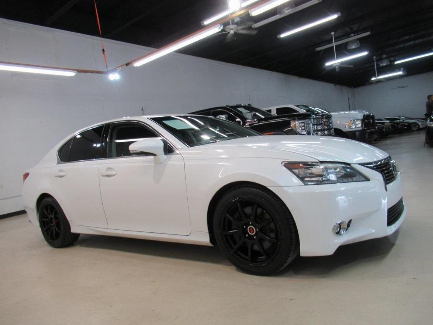 2014 White /Black Lexus GS 350 (JTHBE1BL0E5) with an 3.5L V6 DOHC 24V engine, Automatic transmission, located at 15300 Midway Rd., Addison, TX, 75001, (972) 702-0011, 32.958321, -96.838074 - HOME OF THE NO HAGGLE PRICE - WHOLESALE PRICES TO THE PUBLIC!! GS 350, 4D Sedan, 3.5L V6 DOHC 24V, 8-Speed Automatic with Sequential Shift, RWD, White, Black Leather.<br><br>White 2014 Lexus GS 350<br><br>19/29 City/Highway MPG<br><br>Awards:<br> * JD Power Vehicle Dependability Study (VDS) * JD - Photo#6