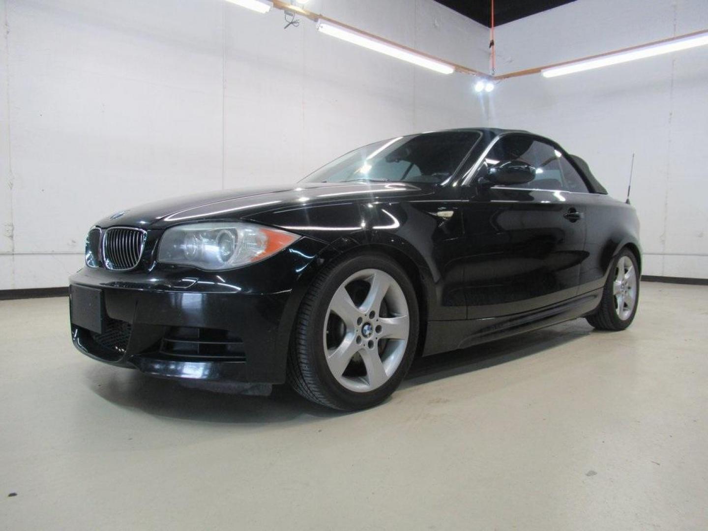 2008 Jet Black /Black Boston BMW 1 Series 135i (WBAUN93548V) with an 3.0L I6 DOHC 24V Twin Turbocharged engine, Automatic transmission, located at 15300 Midway Rd., Addison, TX, 75001, (972) 702-0011, 32.958321, -96.838074 - HOME OF THE NO HAGGLE PRICE - WHOLESALE PRICES TO THE PUBLIC!! 135i, 2D Convertible, 3.0L I6 DOHC 24V Twin Turbocharged, 6-Speed Automatic Steptronic, RWD, Jet Black, Black Boston Leather.<br><br>Jet Black 2008 BMW 1 Series 135i<br><br>17/26 City/Highway MPG<br><br>Awards:<br> * 2008 KBB.com Brand - Photo#1