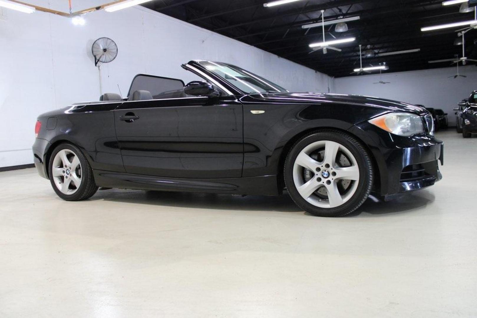 2008 Jet Black /Black Boston BMW 1 Series 135i (WBAUN93548V) with an 3.0L I6 DOHC 24V Twin Turbocharged engine, Automatic transmission, located at 15300 Midway Rd., Addison, TX, 75001, (972) 702-0011, 32.958321, -96.838074 - HOME OF THE NO HAGGLE PRICE - WHOLESALE PRICES TO THE PUBLIC!! 135i, 2D Convertible, 3.0L I6 DOHC 24V Twin Turbocharged, 6-Speed Automatic Steptronic, RWD, Jet Black, Black Boston Leather.<br><br>Jet Black 2008 BMW 1 Series 135i<br><br>17/26 City/Highway MPG<br><br>Awards:<br> * 2008 KBB.com Brand - Photo#4