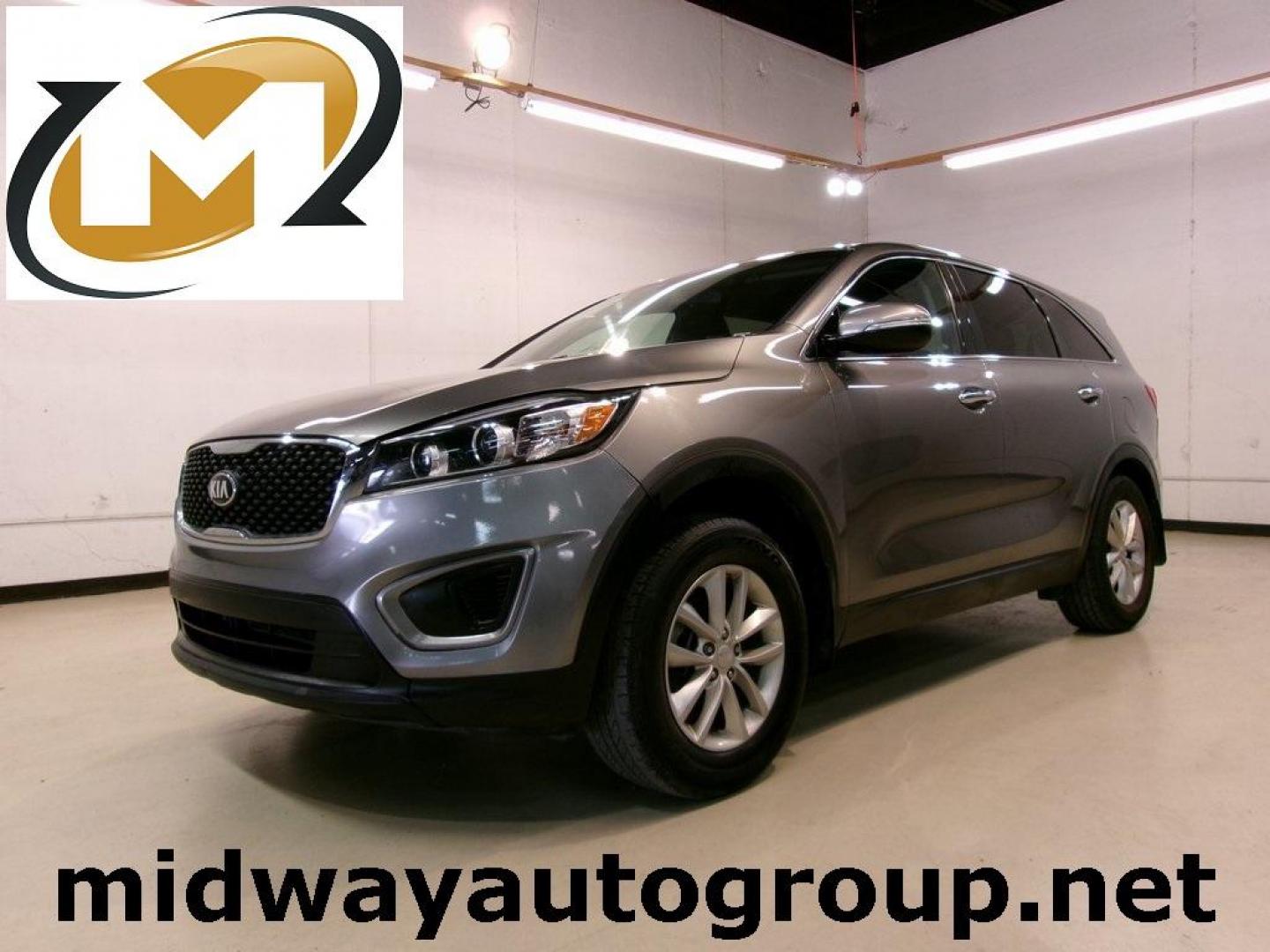 2017 Titanium Silver /Satin Black Kia Sorento L (5XYPG4A32HG) with an 2.4L DOHC engine, Automatic transmission, located at 15300 Midway Rd., Addison, TX, 75001, (972) 702-0011, 32.958321, -96.838074 - HOME OF THE NO HAGGLE PRICE - WHOLESALE PRICES TO THE PUBLIC!! Sorento L, 4D Sport Utility, 2.4L DOHC, 6-Speed Automatic with Sportmatic, FWD, Titanium Silver, Satin Black Cloth.<br><br>Titanium Silver 2017 Kia Sorento L<br><br>21/28 City/Highway MPG<br><br>Awards:<br> * 2017 KBB.com 10 Most Awarde - Photo#0