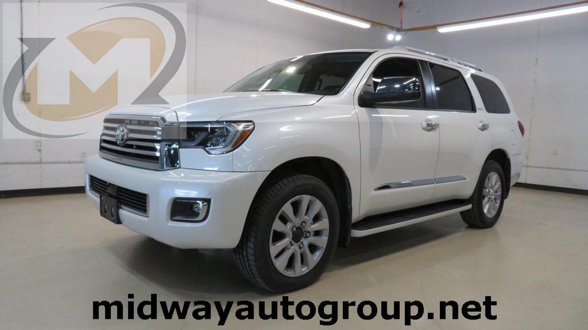 2020 Blizzard Pearl /Sand Beige Toyota Sequoia Platinum (5TDDY5G14LS) with an 5.7L V8 engine, Automatic transmission, located at 15300 Midway Rd., Addison, TX, 75001, (972) 702-0011, 32.958321, -96.838074 - HOME OF THE NO HAGGLE PRICE - WHOLESALE PRICES TO THE PUBLIC!! 4WD, Bluetooth, Hands Free Connectivity, Navigation, Premium Audio, 3rd Row Seat, Backup Camera, Heated Seats, Leather Seats, Sunroof / Moonroof, Power Liftgate, Sequoia Platinum, 4D Sport Utility, 5.7L V8, 6-Speed Automatic, 4WD, White, - Photo#0