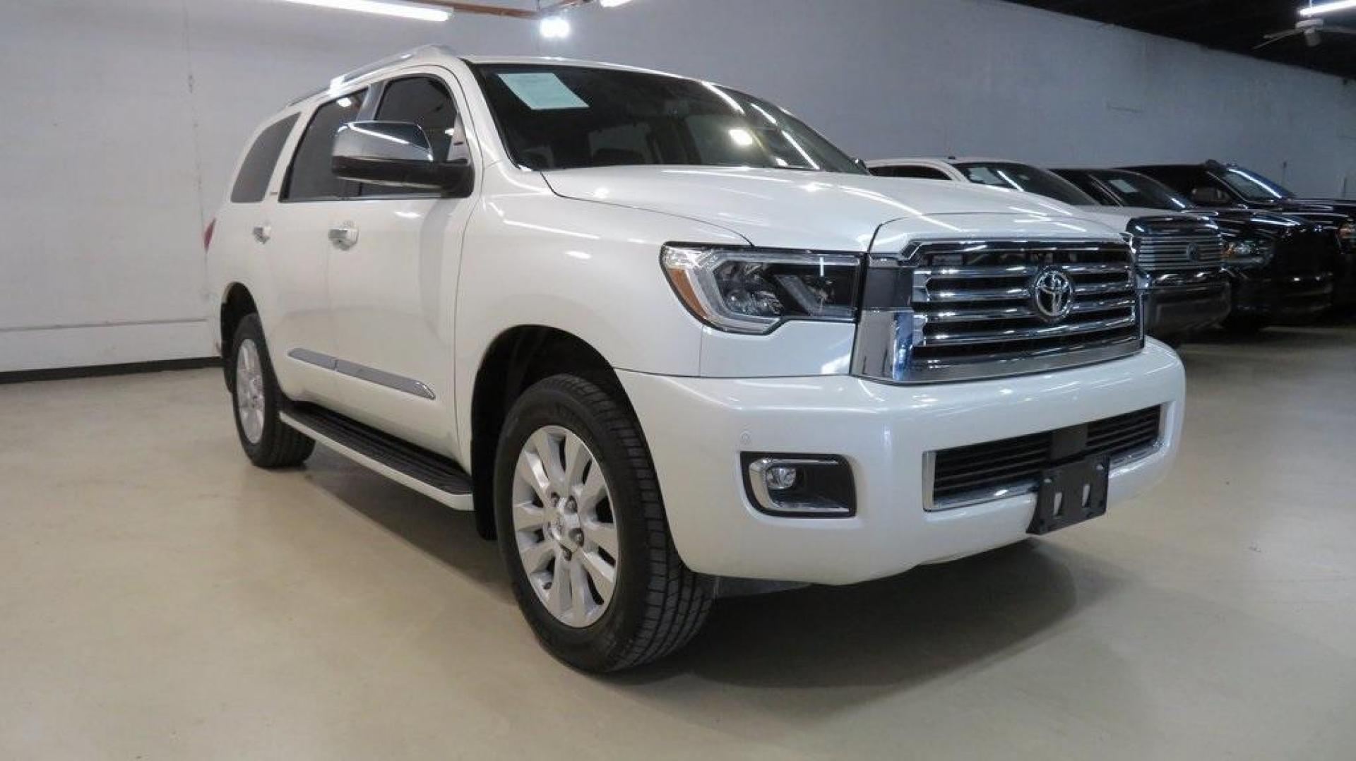 2020 Blizzard Pearl /Sand Beige Toyota Sequoia Platinum (5TDDY5G14LS) with an 5.7L V8 engine, Automatic transmission, located at 15300 Midway Rd., Addison, TX, 75001, (972) 702-0011, 32.958321, -96.838074 - HOME OF THE NO HAGGLE PRICE - WHOLESALE PRICES TO THE PUBLIC!! 4WD, Bluetooth, Hands Free Connectivity, Navigation, Premium Audio, 3rd Row Seat, Backup Camera, Heated Seats, Leather Seats, Sunroof / Moonroof, Power Liftgate, Sequoia Platinum, 4D Sport Utility, 5.7L V8, 6-Speed Automatic, 4WD, White, - Photo#1