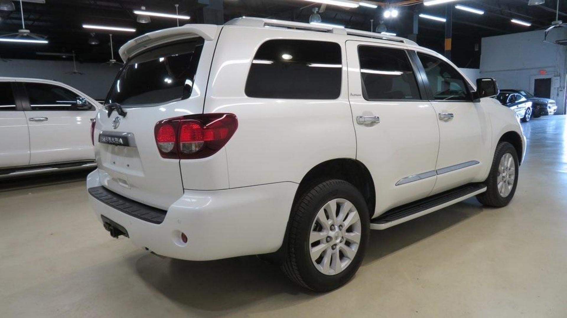 2020 Blizzard Pearl /Sand Beige Toyota Sequoia Platinum (5TDDY5G14LS) with an 5.7L V8 engine, Automatic transmission, located at 15300 Midway Rd., Addison, TX, 75001, (972) 702-0011, 32.958321, -96.838074 - HOME OF THE NO HAGGLE PRICE - WHOLESALE PRICES TO THE PUBLIC!! 4WD, Bluetooth, Hands Free Connectivity, Navigation, Premium Audio, 3rd Row Seat, Backup Camera, Heated Seats, Leather Seats, Sunroof / Moonroof, Power Liftgate, Sequoia Platinum, 4D Sport Utility, 5.7L V8, 6-Speed Automatic, 4WD, White, - Photo#2