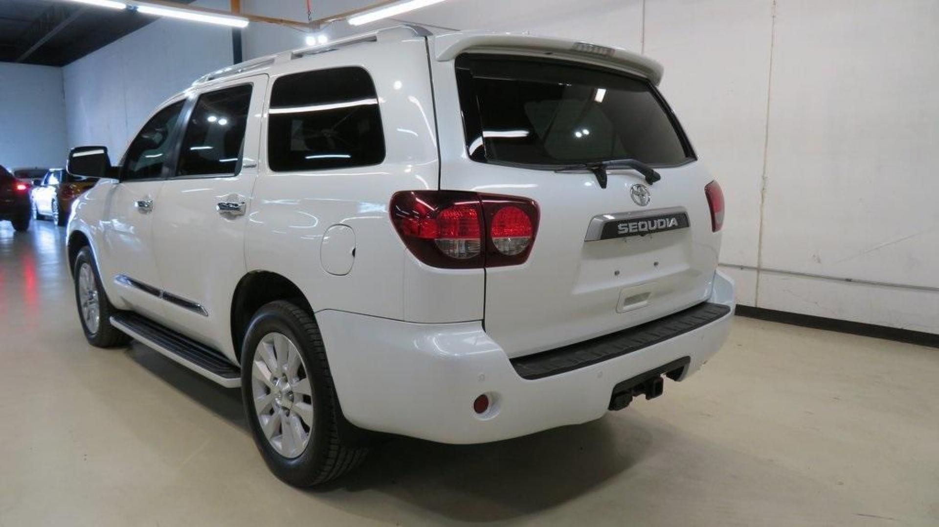 2020 Blizzard Pearl /Sand Beige Toyota Sequoia Platinum (5TDDY5G14LS) with an 5.7L V8 engine, Automatic transmission, located at 15300 Midway Rd., Addison, TX, 75001, (972) 702-0011, 32.958321, -96.838074 - HOME OF THE NO HAGGLE PRICE - WHOLESALE PRICES TO THE PUBLIC!! 4WD, Bluetooth, Hands Free Connectivity, Navigation, Premium Audio, 3rd Row Seat, Backup Camera, Heated Seats, Leather Seats, Sunroof / Moonroof, Power Liftgate, Sequoia Platinum, 4D Sport Utility, 5.7L V8, 6-Speed Automatic, 4WD, White, - Photo#3