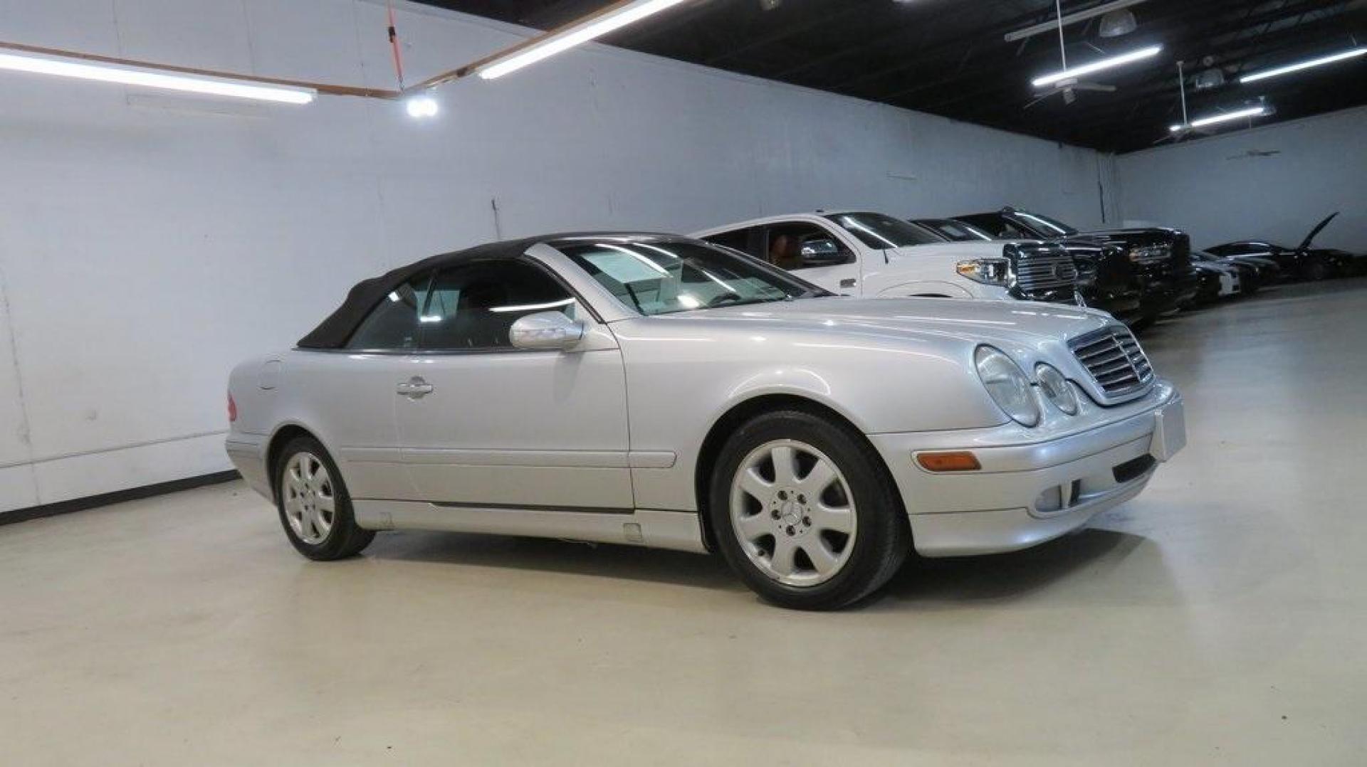 2002 Brilliant Silver Metallic /Pebble Gray Mercedes-Benz CLK CLK 320 (WDBLK65G32T) with an 3.2L V6 SMPI SOHC engine, Automatic transmission, located at 15300 Midway Rd., Addison, TX, 75001, (972) 702-0011, 32.958321, -96.838074 - HOME OF THE NO HAGGLE PRICE - WHOLESALE PRICES TO THE PUBLIC!! CLK 320, 2D Convertible, 3.2L V6 SMPI SOHC, 5-Speed Automatic with Overdrive, RWD, Silver, Pebble Gray Leather.<br><br>Silver 2002 Mercedes-Benz CLK CLK 320<br><br>19/26 City/Highway MPG<br><br><br>At Midway Auto Group, we strive to prov - Photo#6