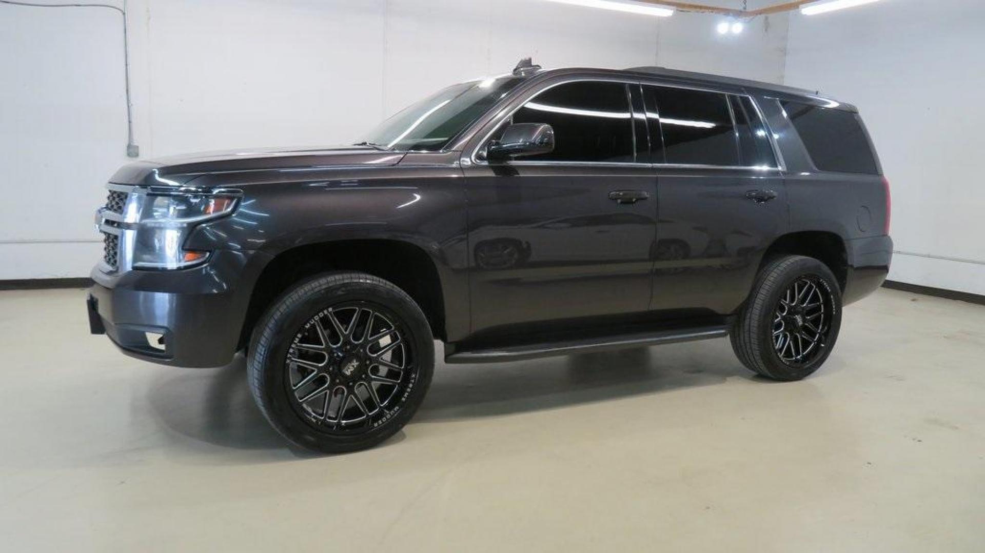 2017 Tungsten Metallic /Black Chevrolet Tahoe LT (1GNSKBKC2HR) with an EcoTec3 5.3L V8 engine, Automatic transmission, located at 15300 Midway Rd., Addison, TX, 75001, (972) 702-0011, 32.958321, -96.838074 - HOME OF THE NO HAGGLE PRICE - WHOLESALE PRICES TO THE PUBLIC!! Tahoe LT, 4D Sport Utility, EcoTec3 5.3L V8, 6-Speed Automatic Electronic with Overdrive, 4WD, Tungsten Metallic, Black Leather, Navigation System.<br><br>Tungsten Metallic 2017 Chevrolet Tahoe LT<br><br><br>Awards:<br> * JD Power Autom - Photo#4