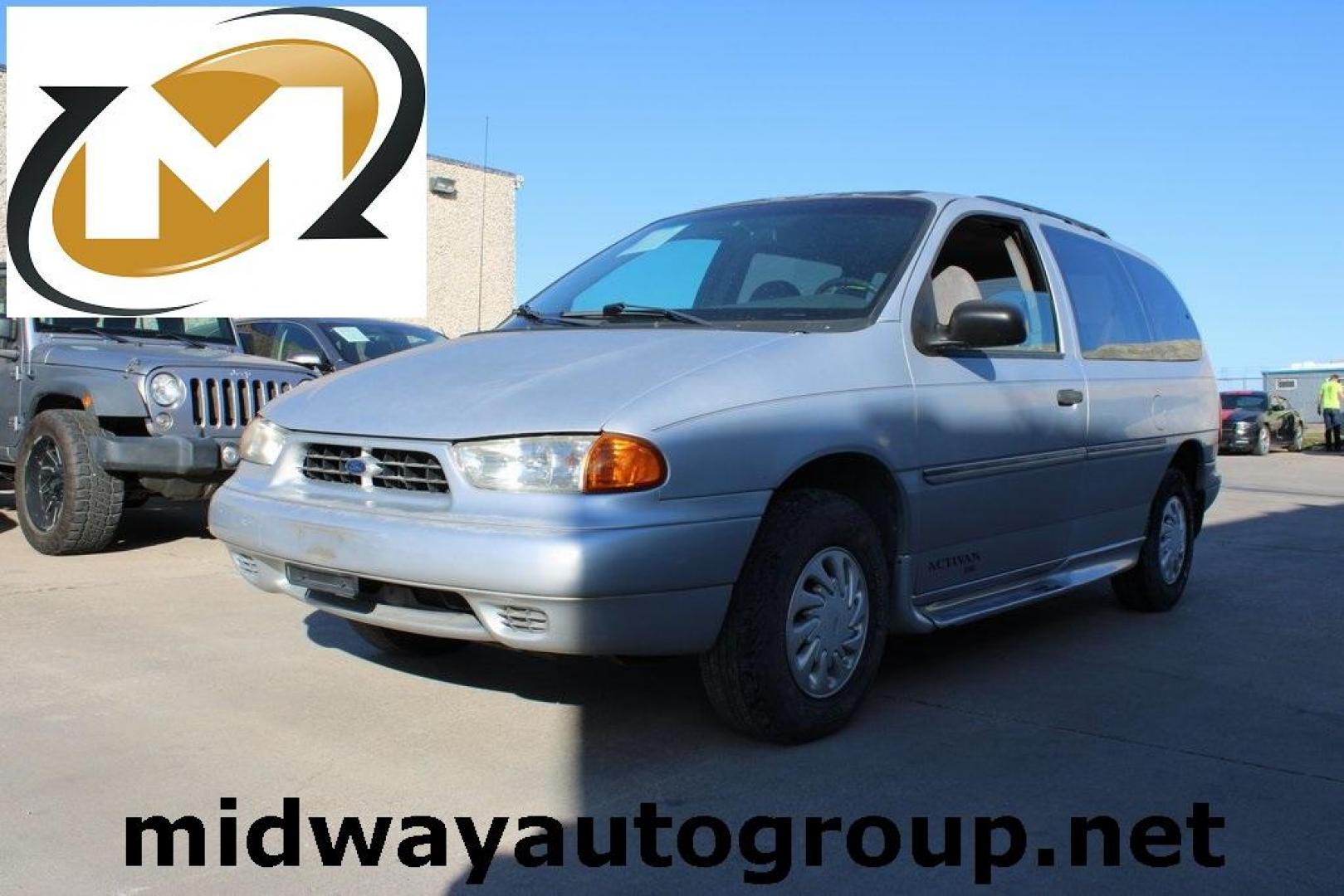 1998 Silver Frost Clearcoat Metallic Ford Windstar GL (2FMDA5149WB) with an 3.8L V6 SFI engine, Automatic transmission, located at 15300 Midway Rd., Addison, TX, 75001, (972) 702-0011, 32.958321, -96.838074 - Photo#0