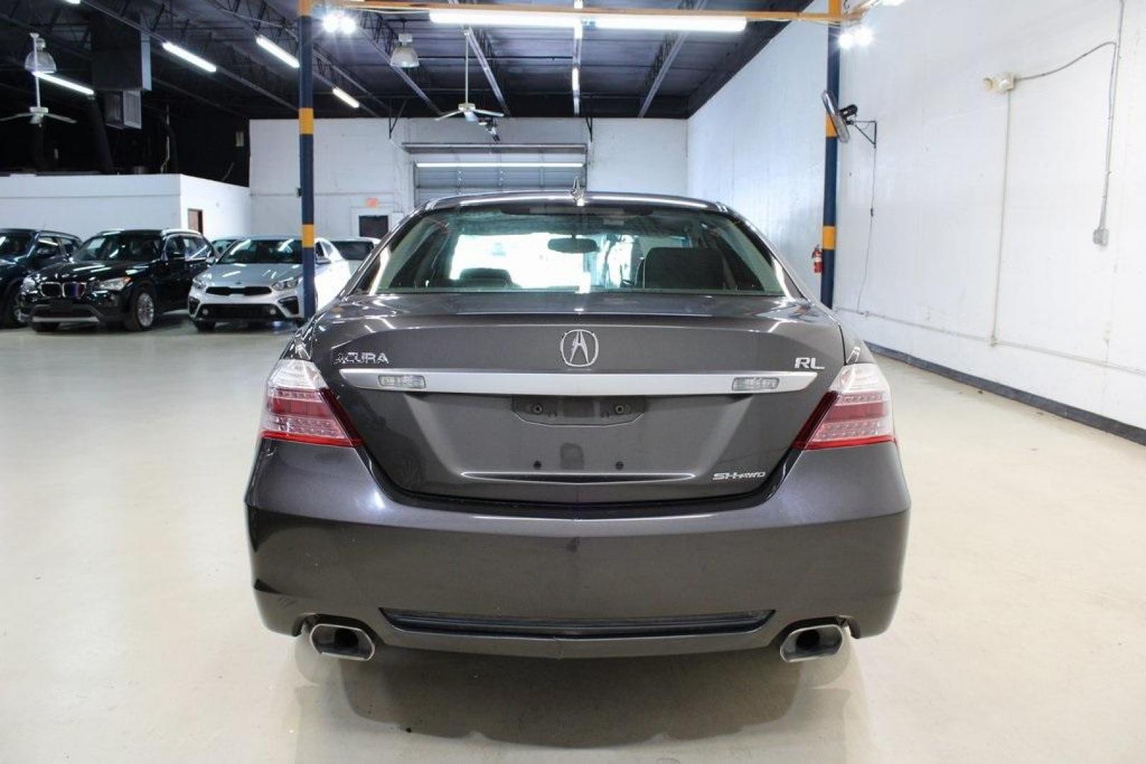 2010 Gray /Ebony Acura RL 3.7 (JH4KB2F56AC) with an 3.7L V6 SOHC VTEC engine, Automatic transmission, located at 15300 Midway Rd., Addison, TX, 75001, (972) 702-0011, 32.958321, -96.838074 - HOME OF THE NO HAGGLE PRICE - WHOLESALE PRICES TO THE PUBLIC!! RL 3.7 SH-AWD, 4D Sedan, 3.7L V6 SOHC VTEC, 5-Speed Automatic with Overdrive, AWD, Gray, Ebony Leather.<br><br>Gray 2010 Acura RL 3.7<br><br><br>At Midway Auto Group, we strive to provide you with the best quality vehicles for the lowest - Photo#4