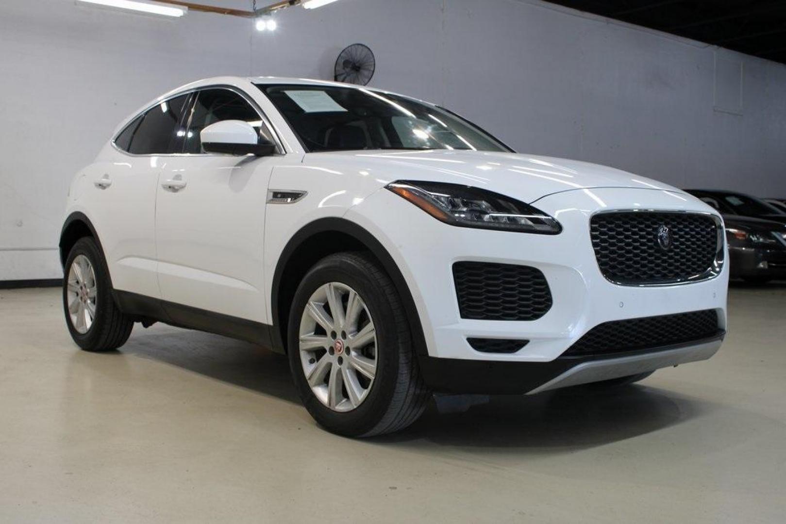 2018 Fuji White /Ebony/Ebony Jaguar E-PACE S (SADFJ2FX2J1) with an 2.0L I4 Turbocharged engine, Automatic transmission, located at 15300 Midway Rd., Addison, TX, 75001, (972) 702-0011, 32.958321, -96.838074 - Photo#1