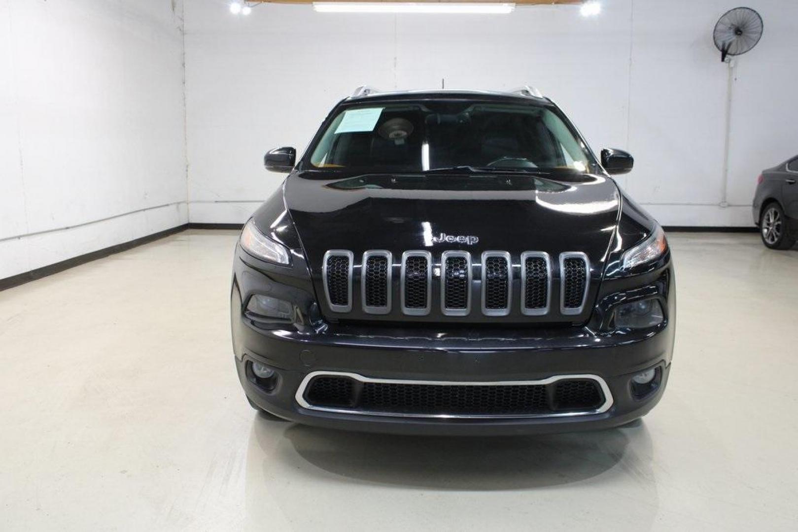 2014 Brilliant Black Crystal Pearlcoat /Black Jeep Cherokee Limited (1C4PJLDS4EW) with an 3.2L V6 engine, Automatic transmission, located at 15300 Midway Rd., Addison, TX, 75001, (972) 702-0011, 32.958321, -96.838074 - HOME OF THE NO HAGGLE PRICE - WHOLESALE PRICES TO THE PUBLIC!! Cherokee Limited, 4D Sport Utility, 3.2L V6, 9-Speed 948TE Automatic, FWD, Brilliant Black Crystal Pearlcoat, Black Leather.<br><br>Brilliant Black Crystal Pearlcoat 2014 Jeep Cherokee Limited<br><br>19/28 City/Highway MPG<br><br>Awards: - Photo#5