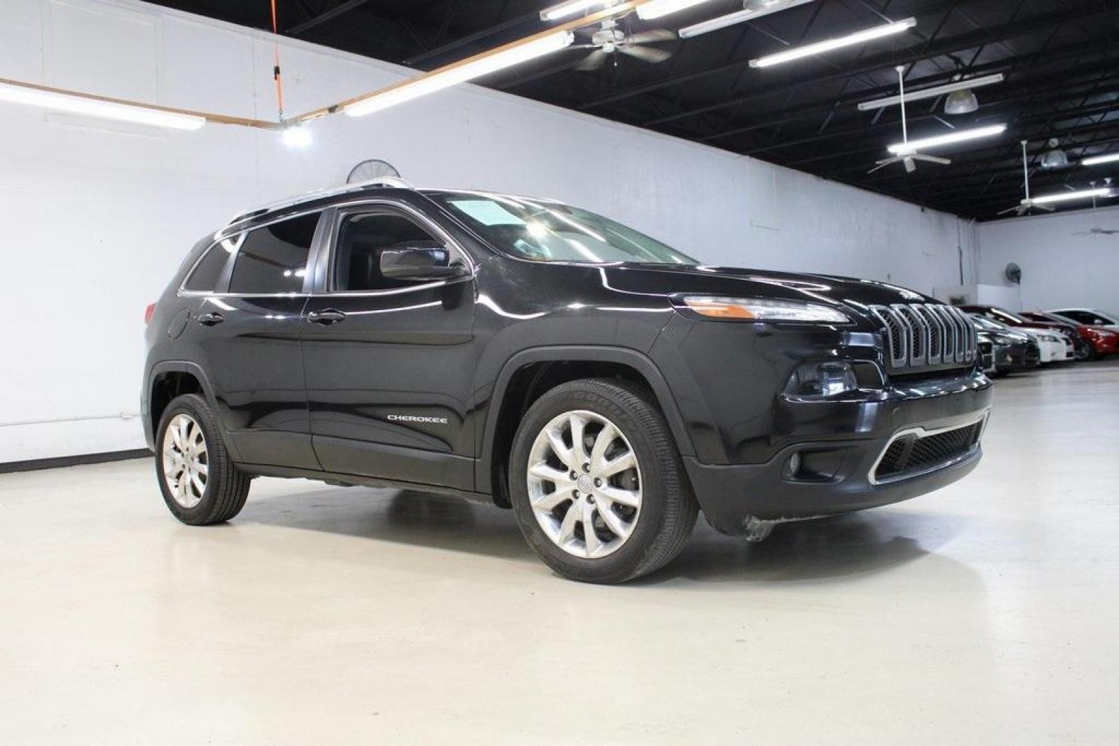 2014 Brilliant Black Crystal Pearlcoat /Black Jeep Cherokee Limited (1C4PJLDS4EW) with an 3.2L V6 engine, Automatic transmission, located at 15300 Midway Rd., Addison, TX, 75001, (972) 702-0011, 32.958321, -96.838074 - HOME OF THE NO HAGGLE PRICE - WHOLESALE PRICES TO THE PUBLIC!! Cherokee Limited, 4D Sport Utility, 3.2L V6, 9-Speed 948TE Automatic, FWD, Brilliant Black Crystal Pearlcoat, Black Leather.<br><br>Brilliant Black Crystal Pearlcoat 2014 Jeep Cherokee Limited<br><br>19/28 City/Highway MPG<br><br>Awards: - Photo#6