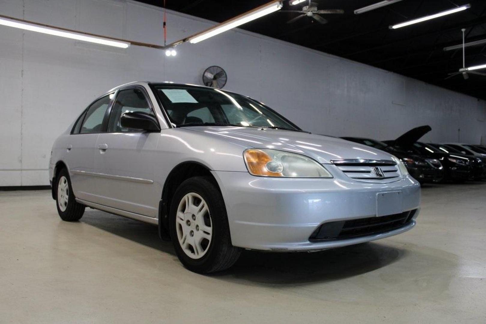 2002 Silver Honda Civic LX (1HGES16522L) with an 1.7L I4 SMPI SOHC engine, Automatic transmission, located at 15300 Midway Rd., Addison, TX, 75001, (972) 702-0011, 32.958321, -96.838074 - Photo#1