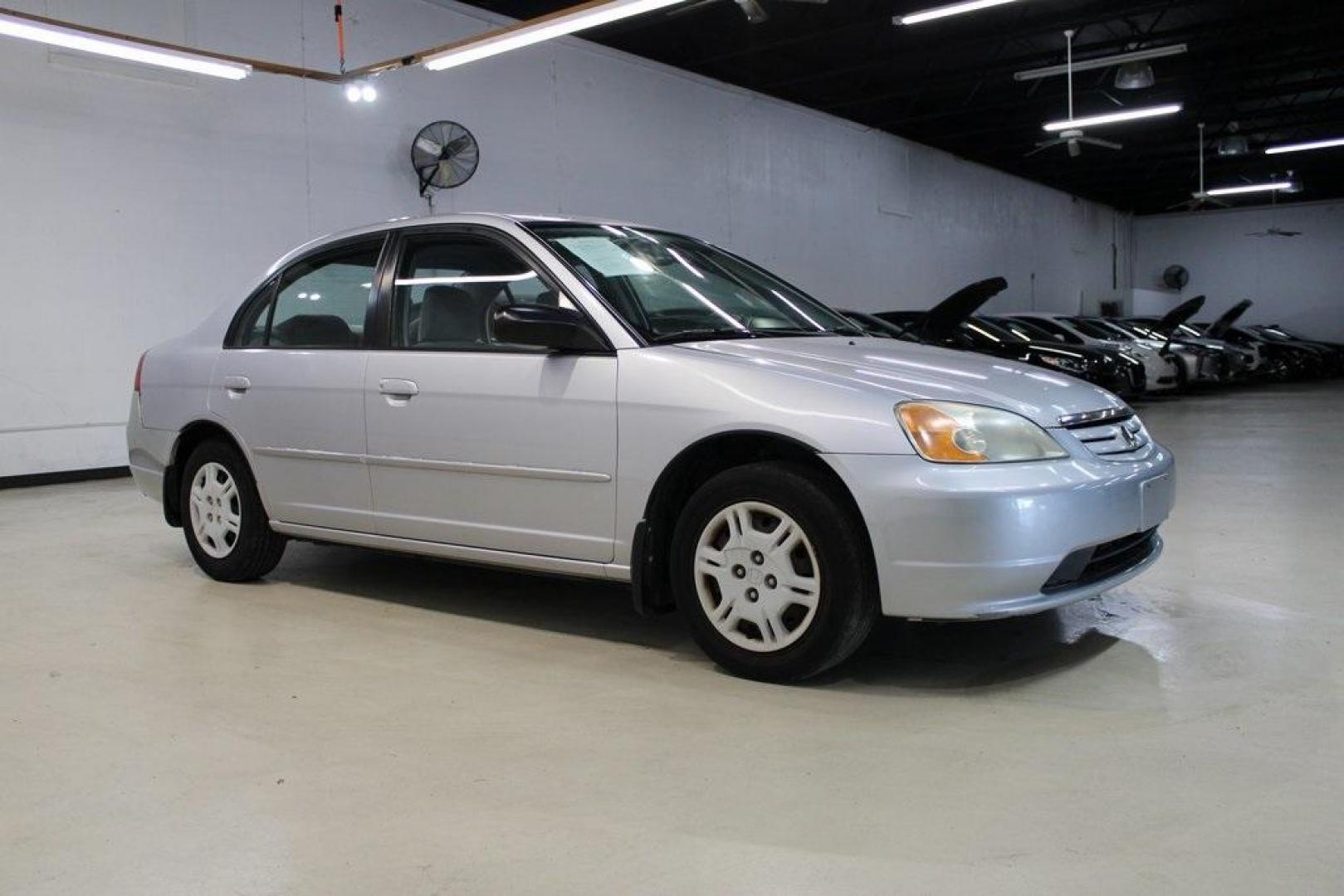 2002 Silver Honda Civic LX (1HGES16522L) with an 1.7L I4 SMPI SOHC engine, Automatic transmission, located at 15300 Midway Rd., Addison, TX, 75001, (972) 702-0011, 32.958321, -96.838074 - Photo#6