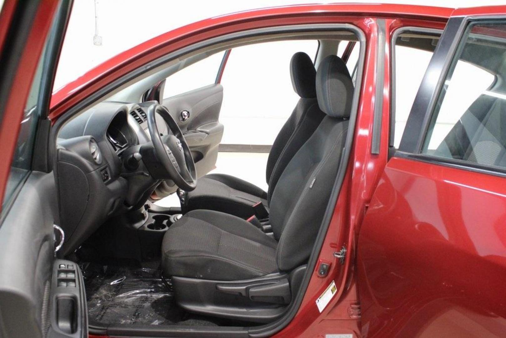 2019 Cayenne Red Metallic /Charcoal Nissan Versa 1.6 SV (3N1CN7APXKL) with an 1.6L 4-Cylinder DOHC 16V engine, CVT transmission, located at 15300 Midway Rd., Addison, TX, 75001, (972) 702-0011, 32.958321, -96.838074 - HOME OF THE NO HAGGLE PRICE - WHOLESALE PRICES TO THE PUBLIC!! Versa 1.6 SV, 4D Sedan, 1.6L 4-Cylinder DOHC 16V, CVT with Xtronic, FWD, Cayenne Red Metallic, Charcoal Cloth.<br><br>Cayenne Red Metallic 2019 Nissan Versa 1.6 SV<br><br>Recent Arrival! 31/39 City/Highway MPG<br><br><br>At Midway Auto G - Photo#12