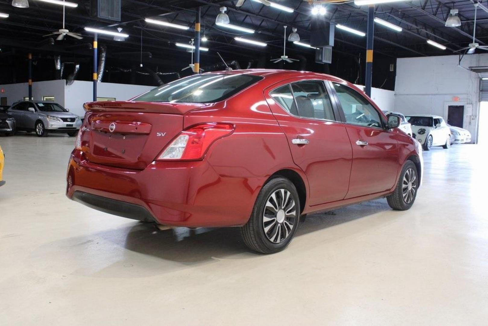 2019 Cayenne Red Metallic /Charcoal Nissan Versa 1.6 SV (3N1CN7APXKL) with an 1.6L 4-Cylinder DOHC 16V engine, CVT transmission, located at 15300 Midway Rd., Addison, TX, 75001, (972) 702-0011, 32.958321, -96.838074 - HOME OF THE NO HAGGLE PRICE - WHOLESALE PRICES TO THE PUBLIC!! Versa 1.6 SV, 4D Sedan, 1.6L 4-Cylinder DOHC 16V, CVT with Xtronic, FWD, Cayenne Red Metallic, Charcoal Cloth.<br><br>Cayenne Red Metallic 2019 Nissan Versa 1.6 SV<br><br>Recent Arrival! 31/39 City/Highway MPG<br><br><br>At Midway Auto G - Photo#2