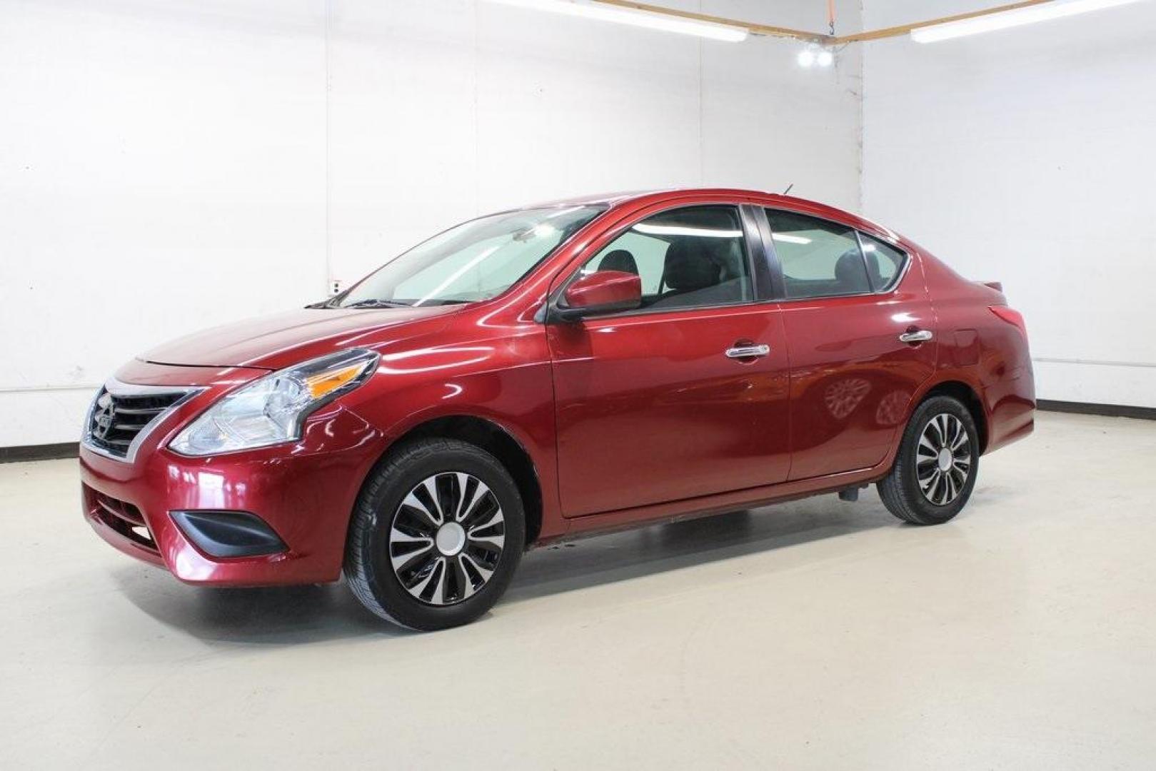 2019 Cayenne Red Metallic /Charcoal Nissan Versa 1.6 SV (3N1CN7APXKL) with an 1.6L 4-Cylinder DOHC 16V engine, CVT transmission, located at 15300 Midway Rd., Addison, TX, 75001, (972) 702-0011, 32.958321, -96.838074 - HOME OF THE NO HAGGLE PRICE - WHOLESALE PRICES TO THE PUBLIC!! Versa 1.6 SV, 4D Sedan, 1.6L 4-Cylinder DOHC 16V, CVT with Xtronic, FWD, Cayenne Red Metallic, Charcoal Cloth.<br><br>Cayenne Red Metallic 2019 Nissan Versa 1.6 SV<br><br>Recent Arrival! 31/39 City/Highway MPG<br><br><br>At Midway Auto G - Photo#4