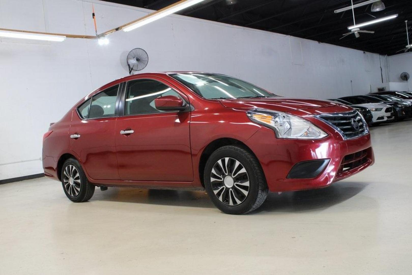 2019 Cayenne Red Metallic /Charcoal Nissan Versa 1.6 SV (3N1CN7APXKL) with an 1.6L 4-Cylinder DOHC 16V engine, CVT transmission, located at 15300 Midway Rd., Addison, TX, 75001, (972) 702-0011, 32.958321, -96.838074 - HOME OF THE NO HAGGLE PRICE - WHOLESALE PRICES TO THE PUBLIC!! Versa 1.6 SV, 4D Sedan, 1.6L 4-Cylinder DOHC 16V, CVT with Xtronic, FWD, Cayenne Red Metallic, Charcoal Cloth.<br><br>Cayenne Red Metallic 2019 Nissan Versa 1.6 SV<br><br>Recent Arrival! 31/39 City/Highway MPG<br><br><br>At Midway Auto G - Photo#6