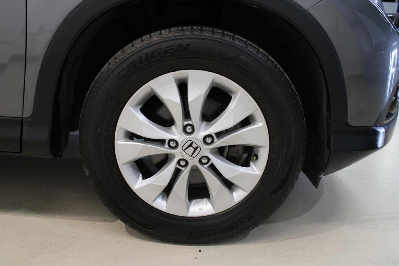 2014 Gray /Gray Honda CR-V EX (3CZRM3H59EG) with an 2.4L I4 DOHC 16V i-VTEC engine, Automatic transmission, located at 15300 Midway Rd., Addison, TX, 75001, (972) 702-0011, 32.958321, -96.838074 - HOME OF THE NO HAGGLE PRICE - WHOLESALE PRICES TO THE PUBLIC!! CR-V EX, 4D Sport Utility, 2.4L I4 DOHC 16V i-VTEC, 5-Speed Automatic, FWD, Gray, Gray Cloth.<br><br>Gray 2014 Honda CR-V EX<br><br>Recent Arrival! 23/31 City/Highway MPG<br><br>Awards:<br> * 2014 KBB.com Brand Image Awards<br>Kelley Bl - Photo#12