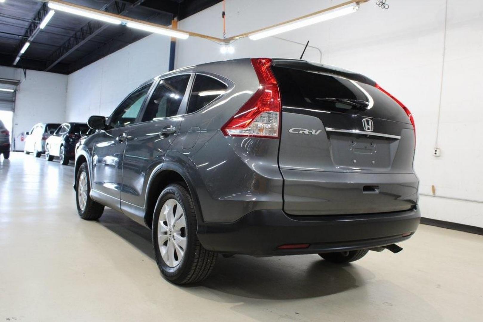 2014 Gray /Gray Honda CR-V EX (3CZRM3H59EG) with an 2.4L I4 DOHC 16V i-VTEC engine, Automatic transmission, located at 15300 Midway Rd., Addison, TX, 75001, (972) 702-0011, 32.958321, -96.838074 - HOME OF THE NO HAGGLE PRICE - WHOLESALE PRICES TO THE PUBLIC!! CR-V EX, 4D Sport Utility, 2.4L I4 DOHC 16V i-VTEC, 5-Speed Automatic, FWD, Gray, Gray Cloth.<br><br>Gray 2014 Honda CR-V EX<br><br>Recent Arrival! 23/31 City/Highway MPG<br><br>Awards:<br> * 2014 KBB.com Brand Image Awards<br>Kelley Bl - Photo#3