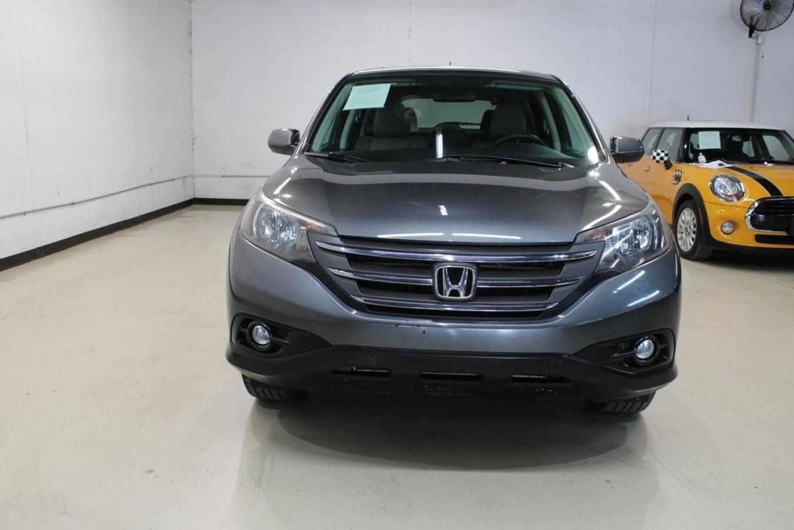 2014 Gray /Gray Honda CR-V EX (3CZRM3H59EG) with an 2.4L I4 DOHC 16V i-VTEC engine, Automatic transmission, located at 15300 Midway Rd., Addison, TX, 75001, (972) 702-0011, 32.958321, -96.838074 - HOME OF THE NO HAGGLE PRICE - WHOLESALE PRICES TO THE PUBLIC!! CR-V EX, 4D Sport Utility, 2.4L I4 DOHC 16V i-VTEC, 5-Speed Automatic, FWD, Gray, Gray Cloth.<br><br>Gray 2014 Honda CR-V EX<br><br>Recent Arrival! 23/31 City/Highway MPG<br><br>Awards:<br> * 2014 KBB.com Brand Image Awards<br>Kelley Bl - Photo#5