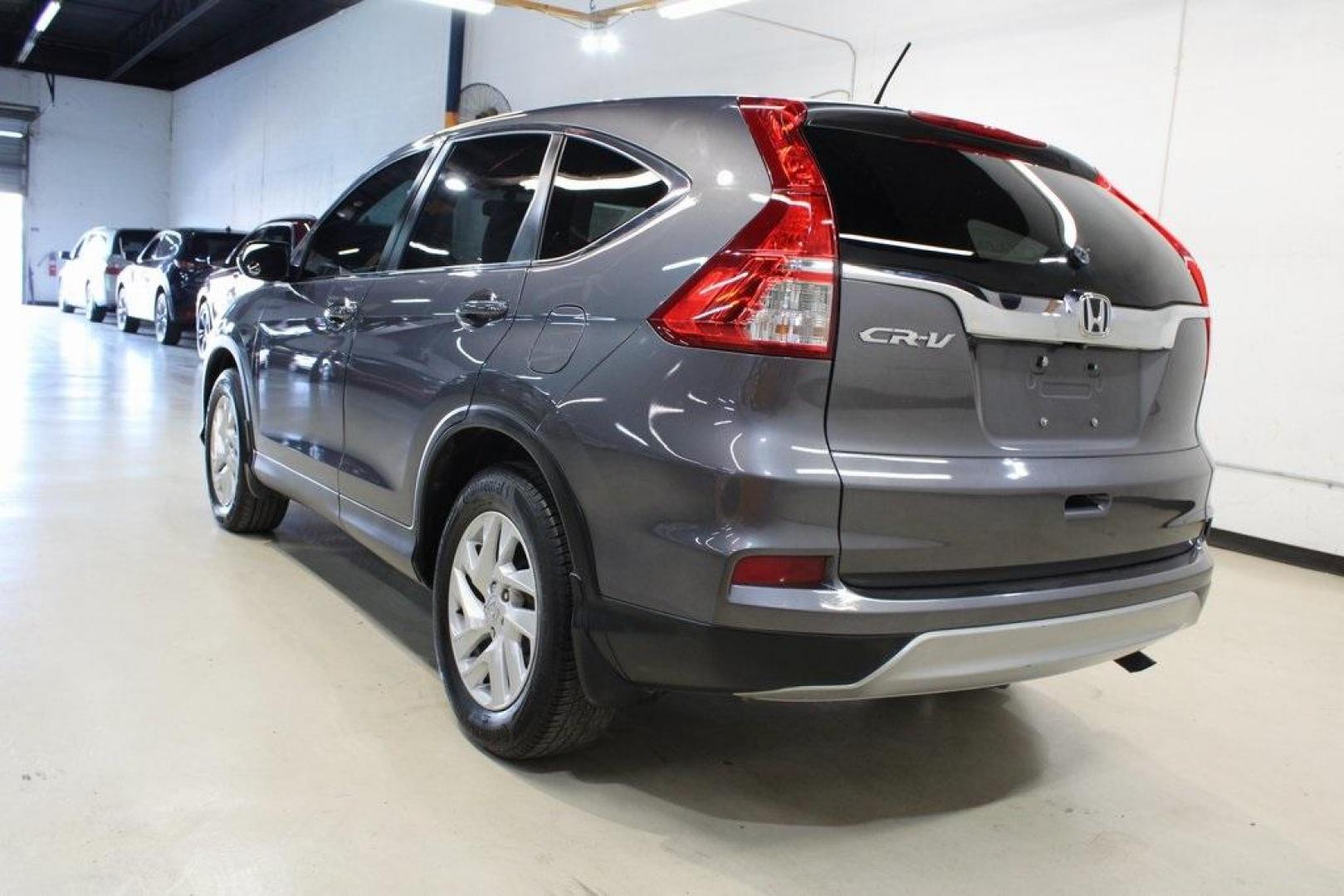 2016 Gray /Gray Honda CR-V EX (3CZRM3H53GG) with an 2.4L I4 DOHC 16V i-VTEC engine, CVT transmission, located at 15300 Midway Rd., Addison, TX, 75001, (972) 702-0011, 32.958321, -96.838074 - Photo#3