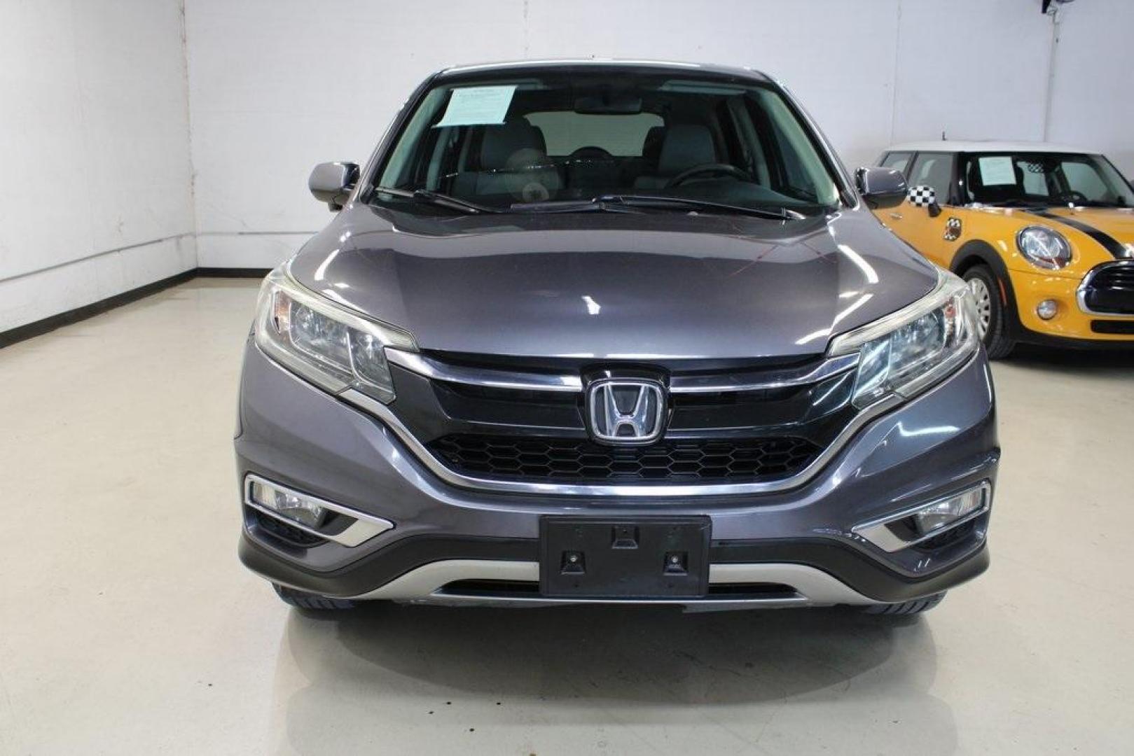 2016 Gray /Gray Honda CR-V EX (3CZRM3H53GG) with an 2.4L I4 DOHC 16V i-VTEC engine, CVT transmission, located at 15300 Midway Rd., Addison, TX, 75001, (972) 702-0011, 32.958321, -96.838074 - Photo#5