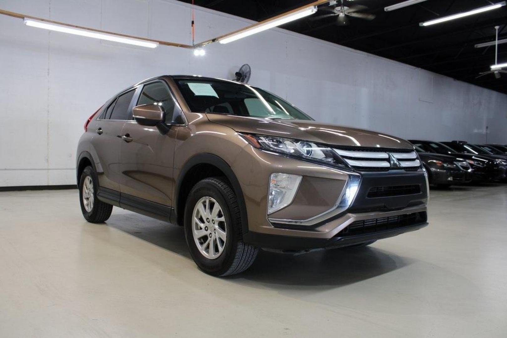 2018 Bronze Metallic Mitsubishi Eclipse Cross ES (JA4AT3AA1JZ) with an 1.5L I4 Turbocharged DOHC 16V LEV3-ULEV70 152hp engine, CVT transmission, located at 15300 Midway Rd., Addison, TX, 75001, (972) 702-0011, 32.958321, -96.838074 - Photo#1