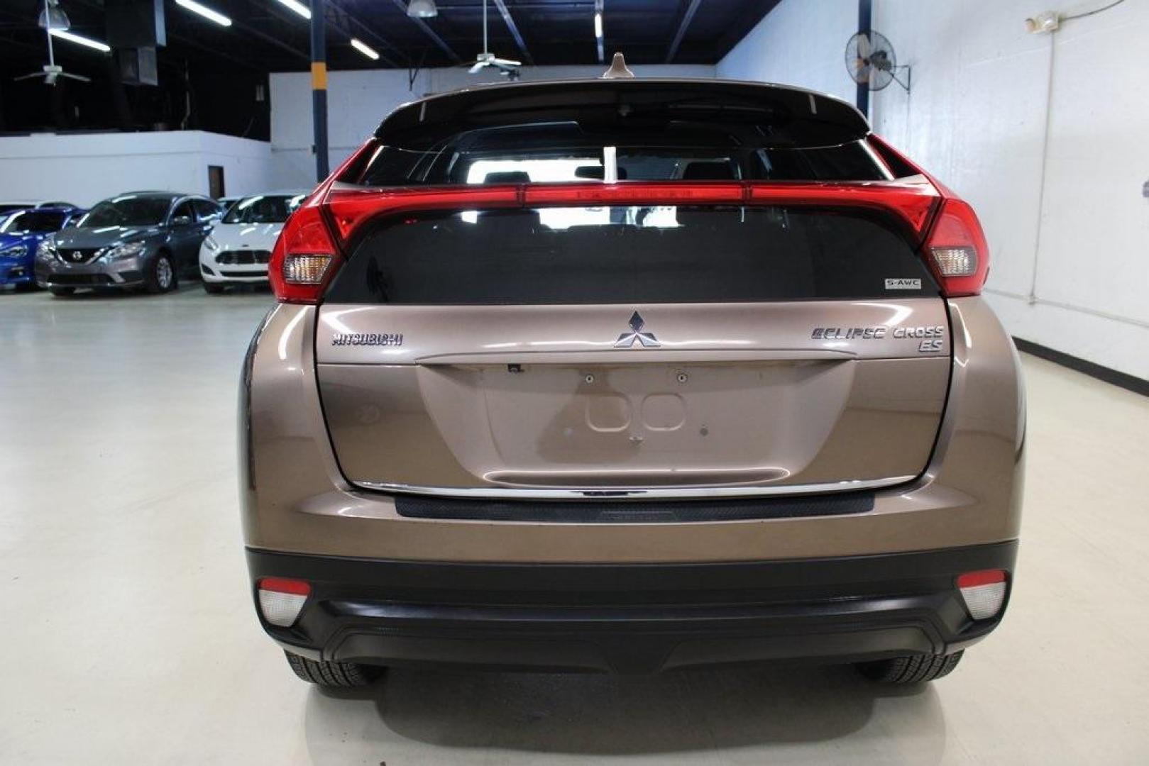 2018 Bronze Metallic Mitsubishi Eclipse Cross ES (JA4AT3AA1JZ) with an 1.5L I4 Turbocharged DOHC 16V LEV3-ULEV70 152hp engine, CVT transmission, located at 15300 Midway Rd., Addison, TX, 75001, (972) 702-0011, 32.958321, -96.838074 - Photo#7