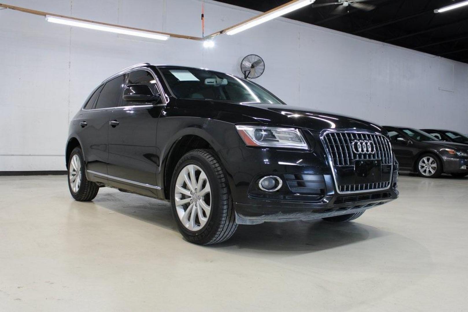 2015 Black Audi Q5 2.0T Premium Plus (WA1LFAFP8FA) with an 2.0L 4-Cylinder TFSI engine, Automatic transmission, located at 15300 Midway Rd., Addison, TX, 75001, (972) 702-0011, 32.958321, -96.838074 - Photo#1