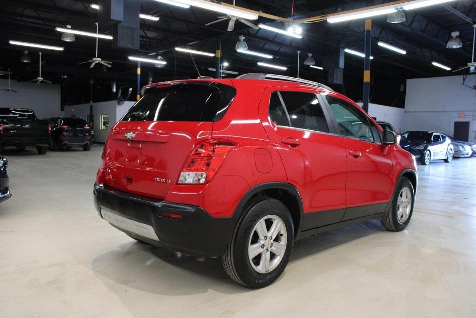 2015 Blaze Red /Jet Black Chevrolet Trax LT (KL7CJLSB1FB) with an ECOTEC 1.4L I4 SMPI DOHC Turbocharged VVT engine, Automatic transmission, located at 15300 Midway Rd., Addison, TX, 75001, (972) 702-0011, 32.958321, -96.838074 - Photo#2